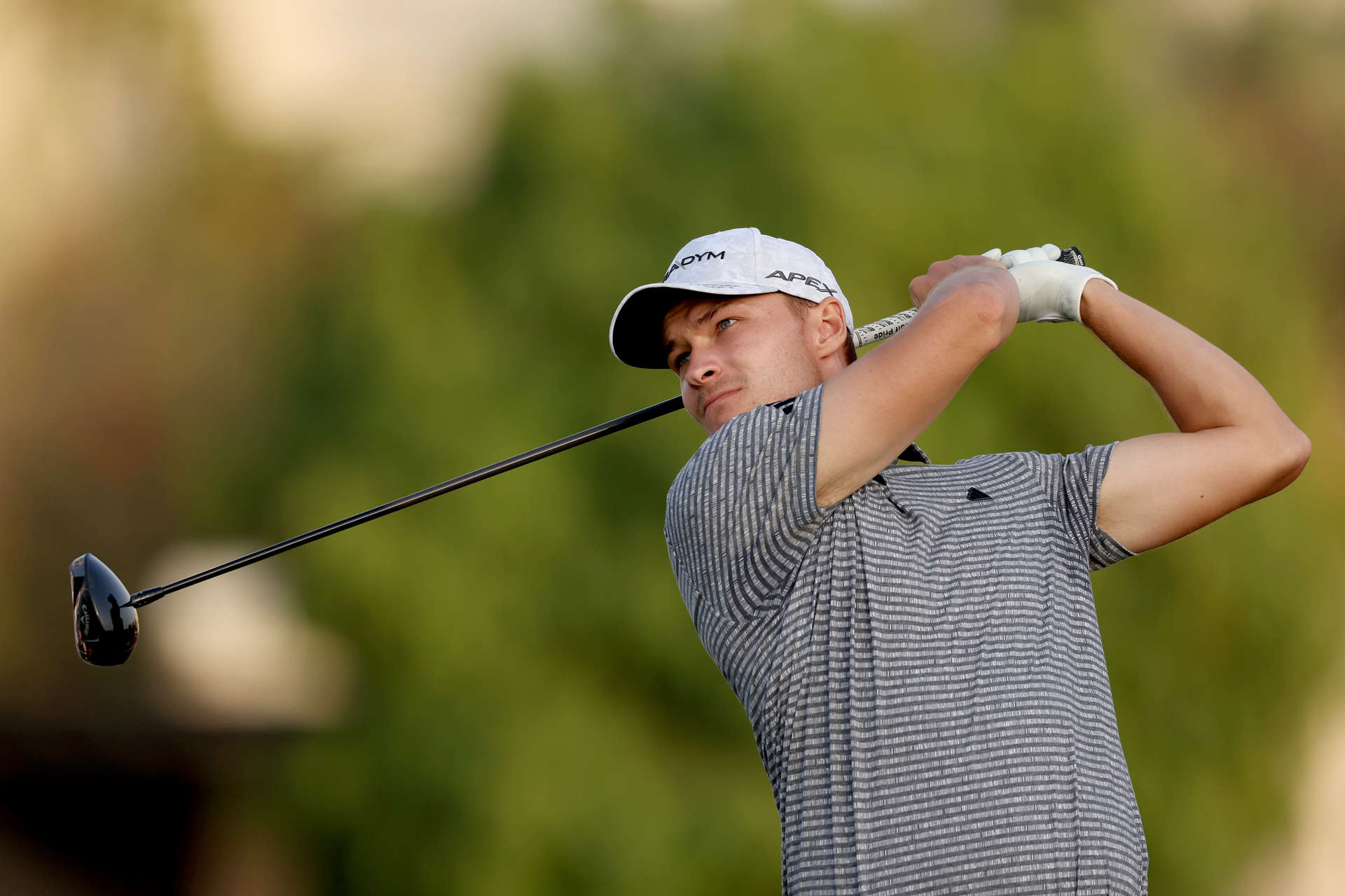RAS AL KHAIMAH, UNITED ARAB EMIRATES - FEBRUARY 03: Rasmus Hojgaard of Denmark plays his tee shot from the 18th Hole on Day Two of the Ras Al Khaimah Championship at Al Hamra Golf Club on February 03, 2023 in Ras al Khaimah, United Arab Emirates. (Photo by Warren Little/Getty Images)