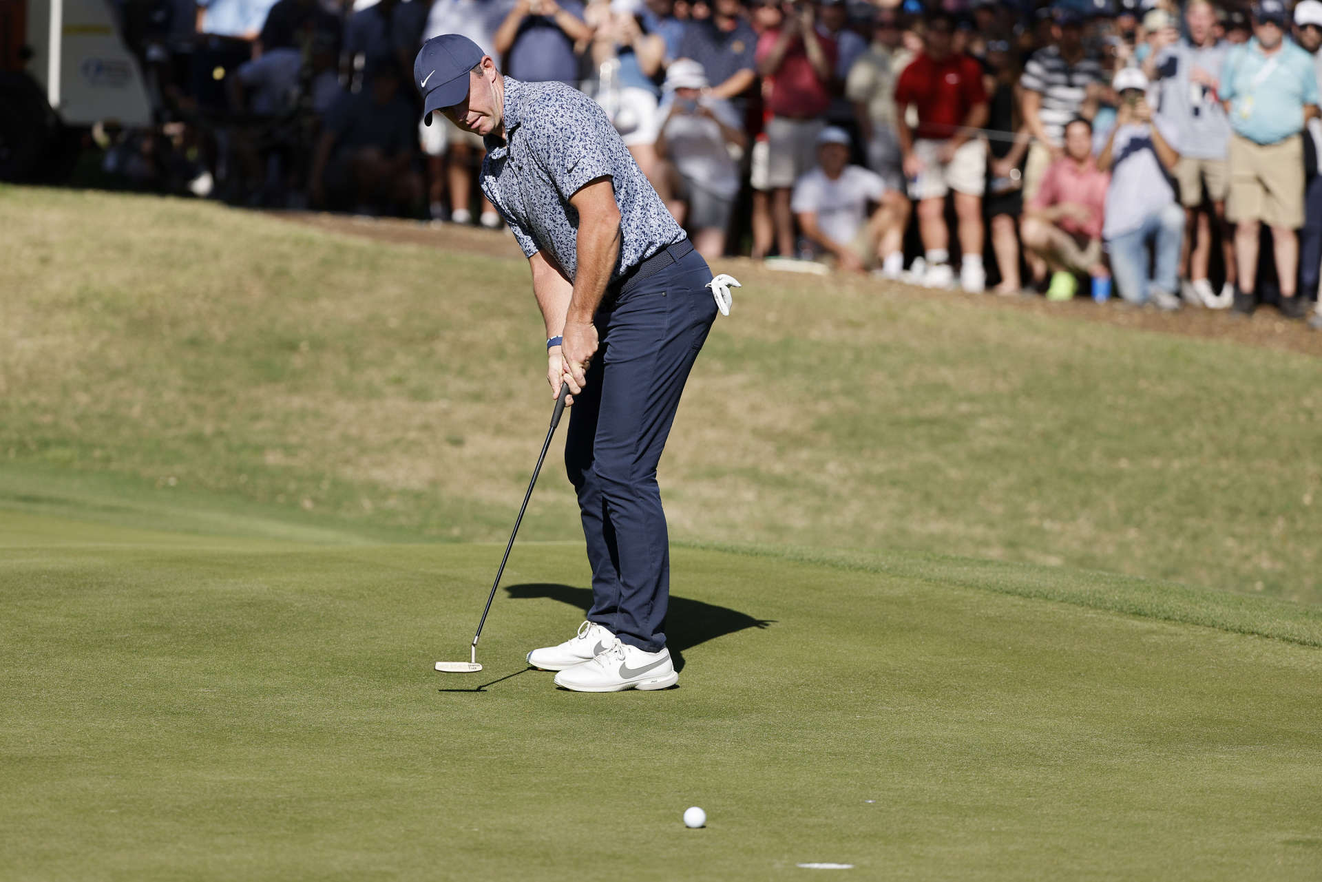 AUSTIN, TEXAS - MARCH 25: Rory McIlroy of Northern Ireland putts on the 18th green during day four of the World Golf Championships-Dell Technologies Match Play at Austin Country Club on March 25, 2023 in Austin, Texas. (Photo by Mike Mulholland/Getty Images)