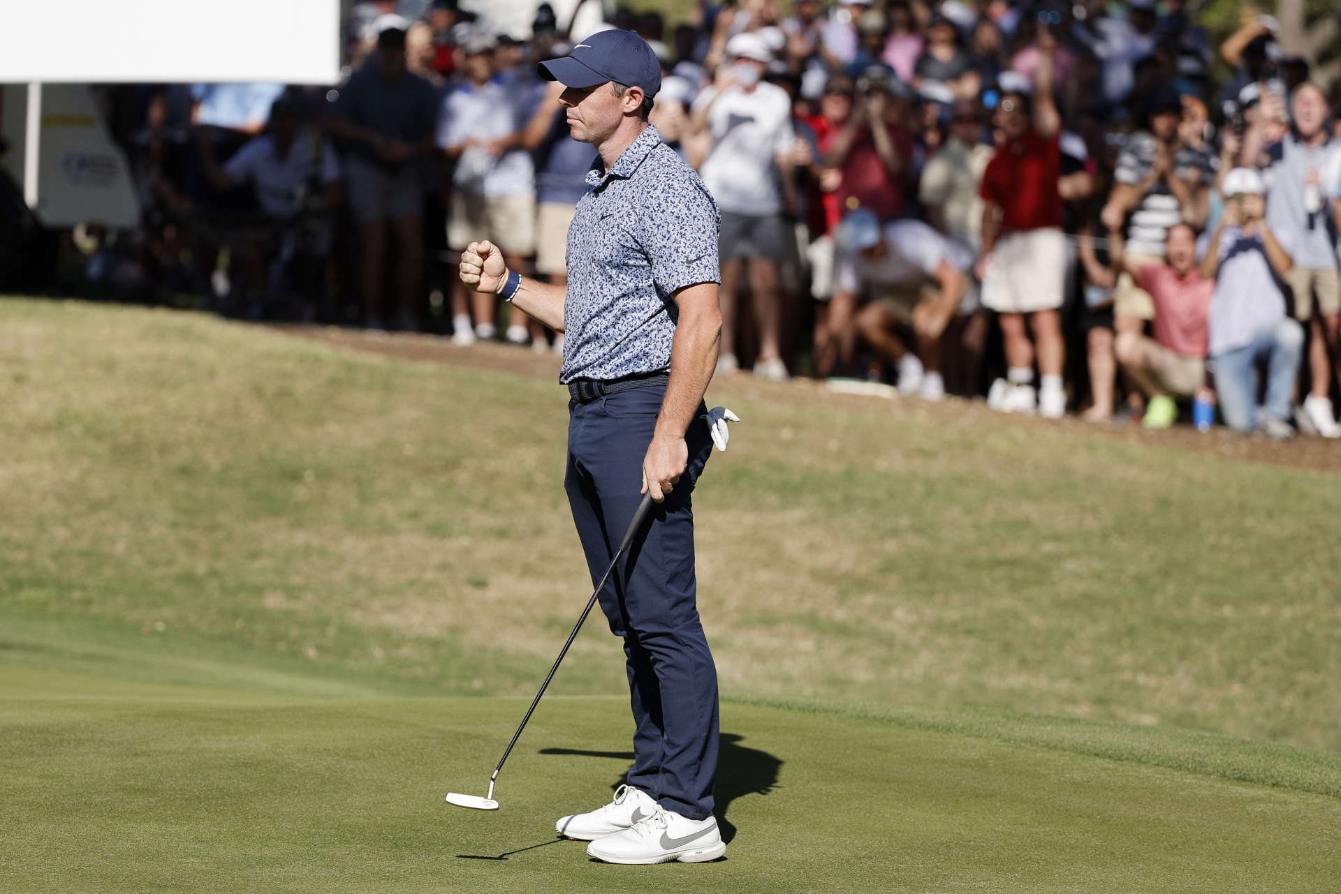 AUSTIN, TEXAS - MARCH 25: Rory McIlroy of Northern Ireland reacts after making birdie on the 18th green to beat Xander Schauffele of the United States 1 up during day four of the World Golf Championships-Dell Technologies Match Play at Austin Country Club on March 25, 2023 in Austin, Texas. (Photo by Mike Mulholland/Getty Images)