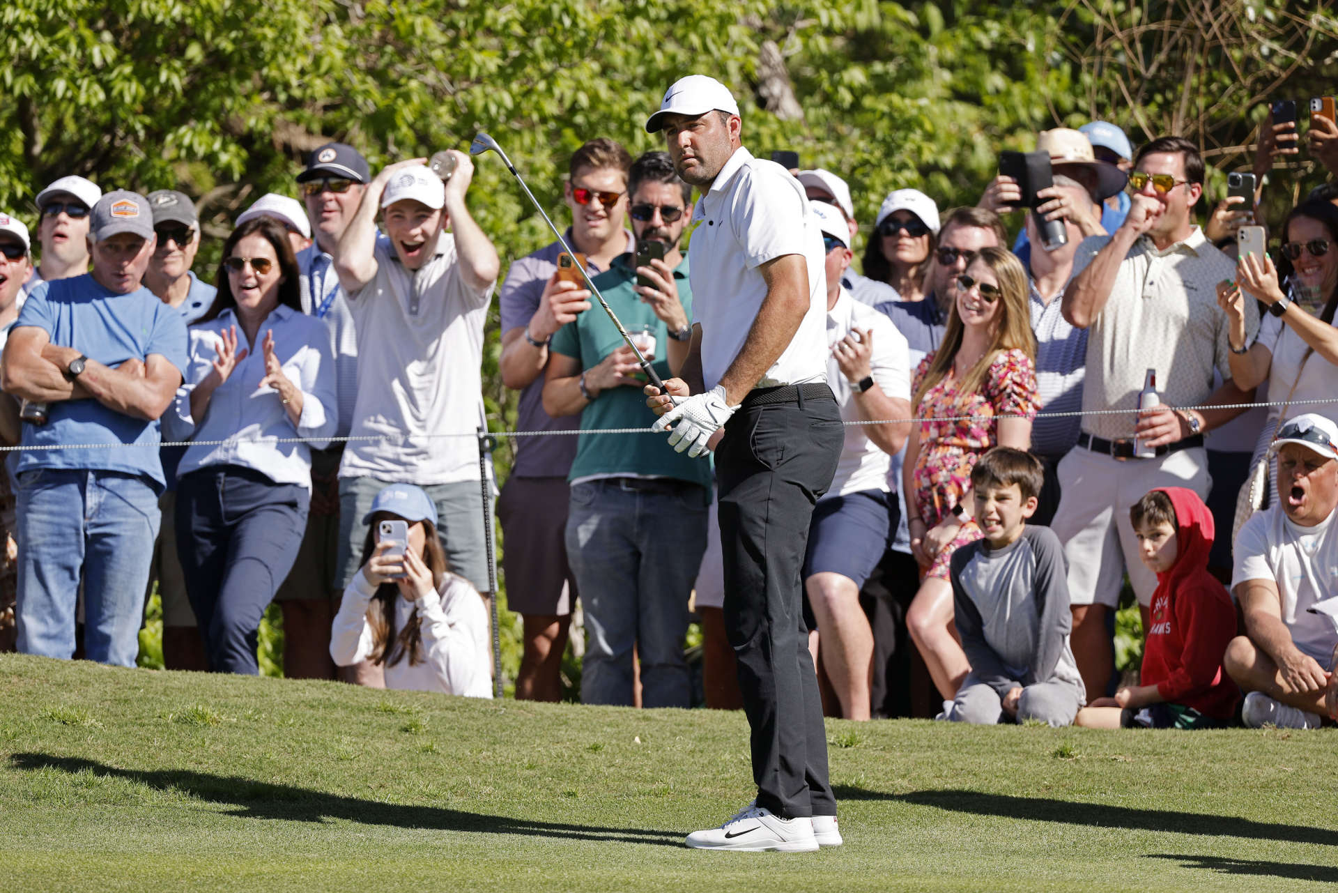 AUSTIN, TEXAS - MARCH 25: Scottie Scheffler of the United States follows his shot on the 16th hole during day four of the World Golf Championships-Dell Technologies Match Play at Austin Country Club on March 25, 2023 in Austin, Texas. (Photo by Mike Mulholland/Getty Images)