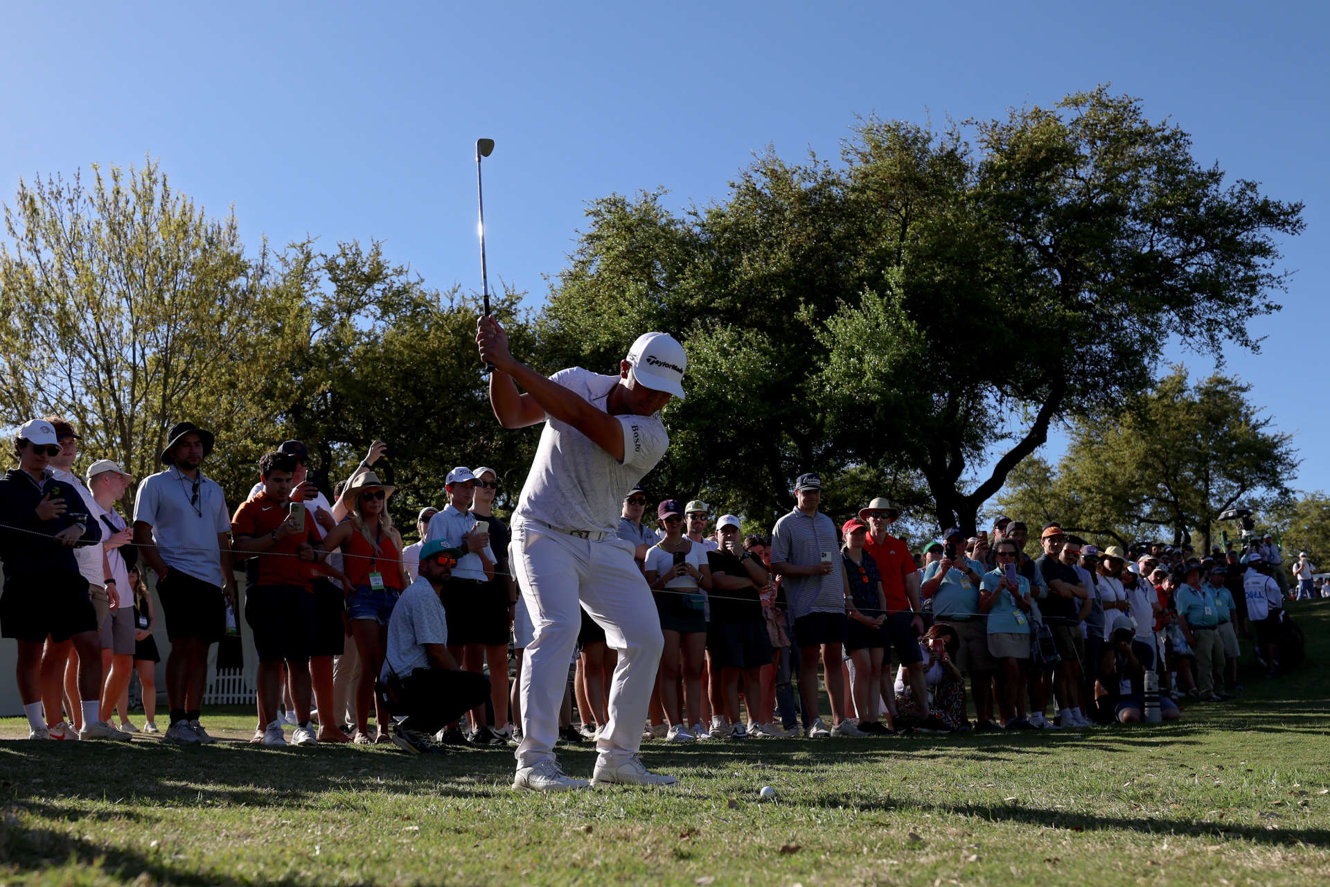 AUSTIN, TEXAS - MARCH 25: Kurt Kitayama of the United States plays his shot on the 18th hole during day four of the World Golf Championships-Dell Technologies Match Play at Austin Country Club on March 25, 2023 in Austin, Texas. (Photo by Tom Pennington/Getty Images)