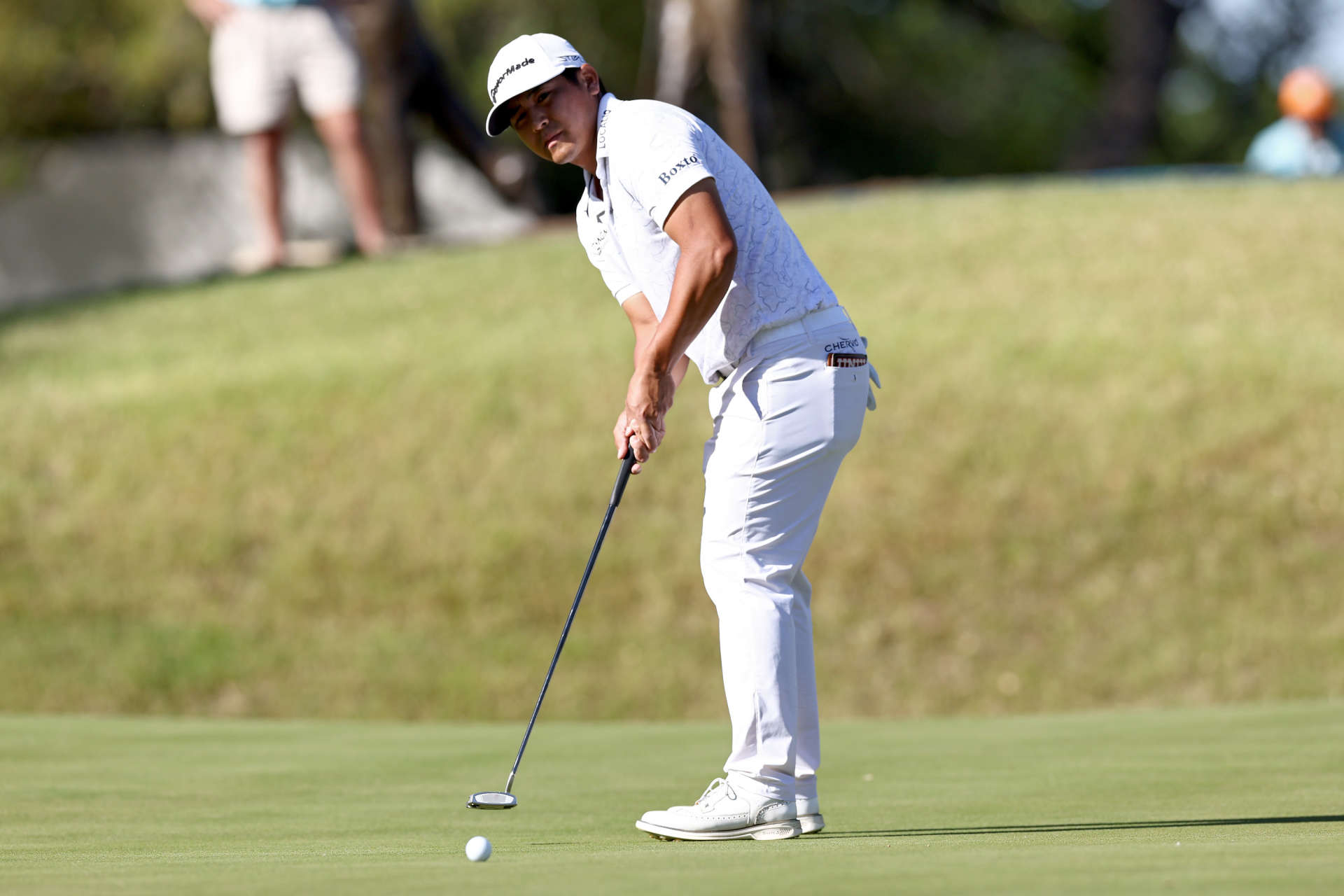 AUSTIN, TEXAS - MARCH 25: Kurt Kitayama of the United States putts on the 18th green during day four of the World Golf Championships-Dell Technologies Match Play at Austin Country Club on March 25, 2023 in Austin, Texas. (Photo by Tom Pennington/Getty Images)