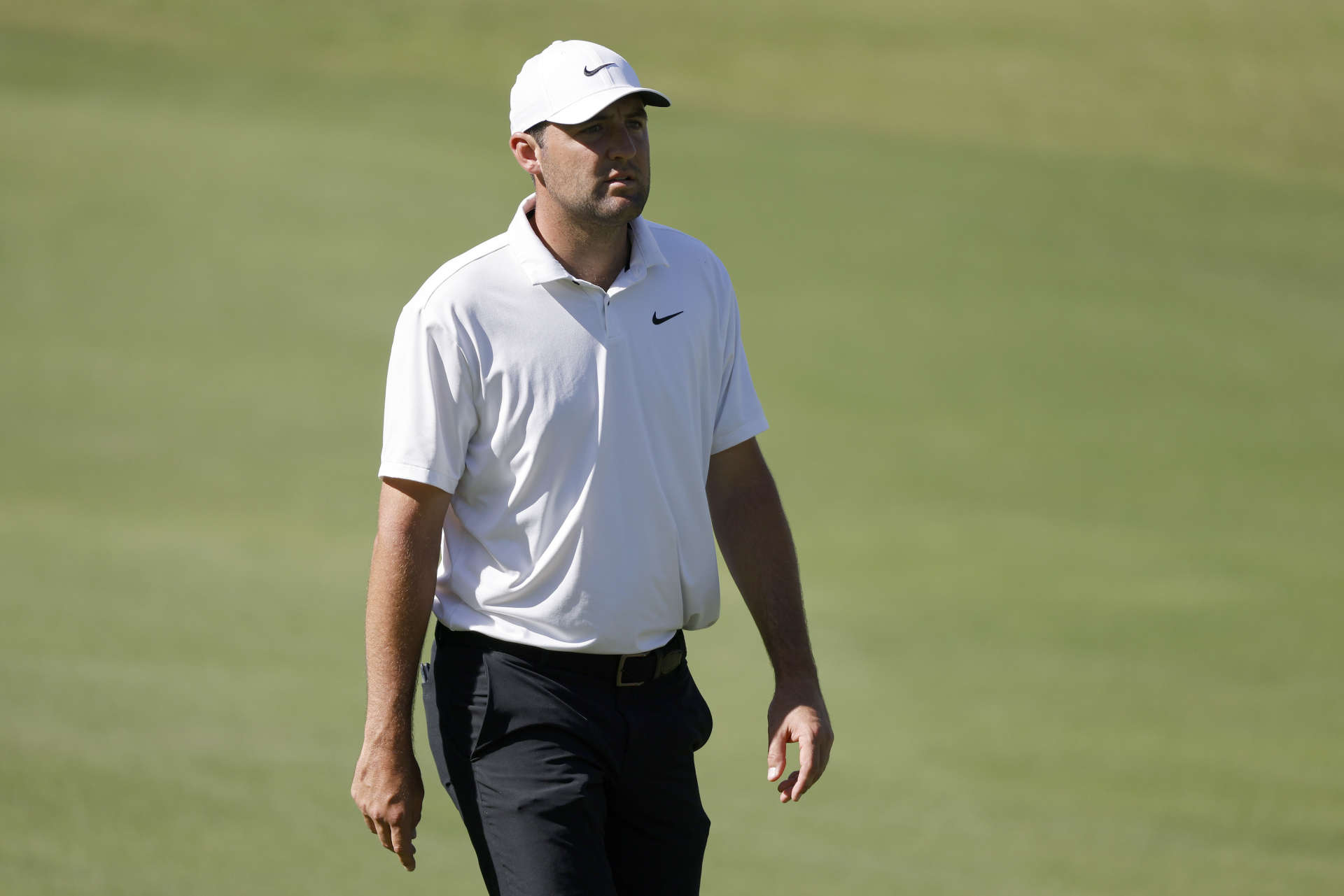 AUSTIN, TEXAS - MARCH 25: Scottie Scheffler of the United States walks across the 16th hole during day four of the World Golf Championships-Dell Technologies Match Play at Austin Country Club on March 25, 2023 in Austin, Texas. (Photo by Mike Mulholland/Getty Images)