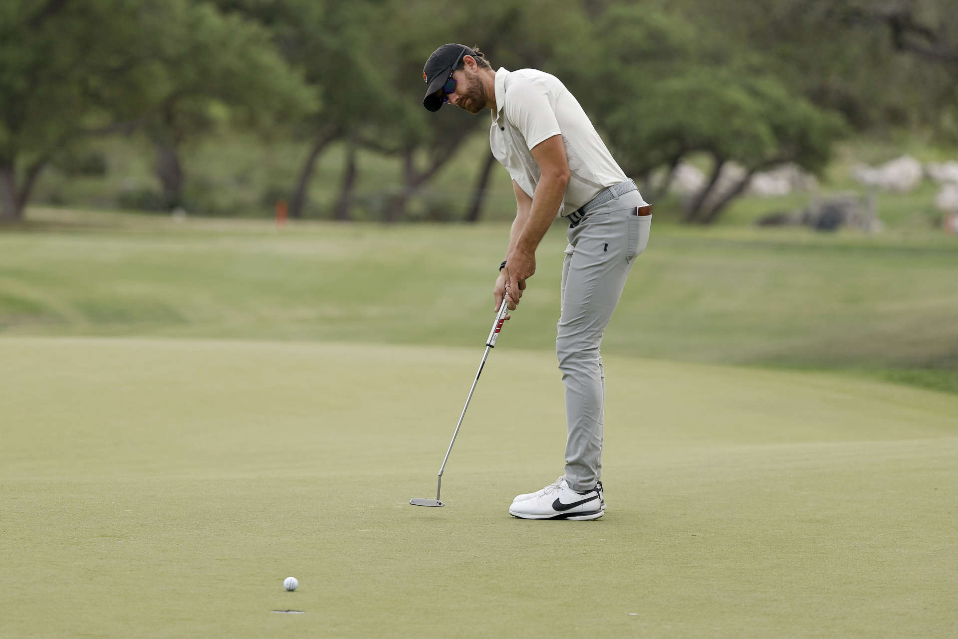 SAN ANTONIO, TEXAS - APRIL 01: Patrick Rodgers of the United States putts on the 18th green during the third round of the Valero Texas Open at TPC San Antonio on April 01, 2023 in San Antonio, Texas. (Photo by Mike Mulholland/Getty Images)