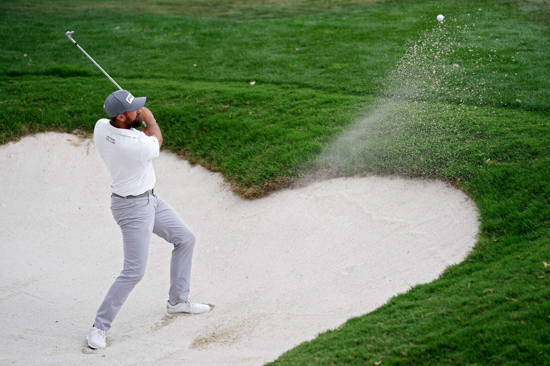 SAN ANTONIO, TEXAS - APRIL 01: Michael Thompson of the United States plays his shot from the bunker on the 18th hole during the third round of the Valero Texas Open at TPC San Antonio on April 01, 2023 in San Antonio, Texas. (Photo by Alex Bierens de Haan/Getty Images)