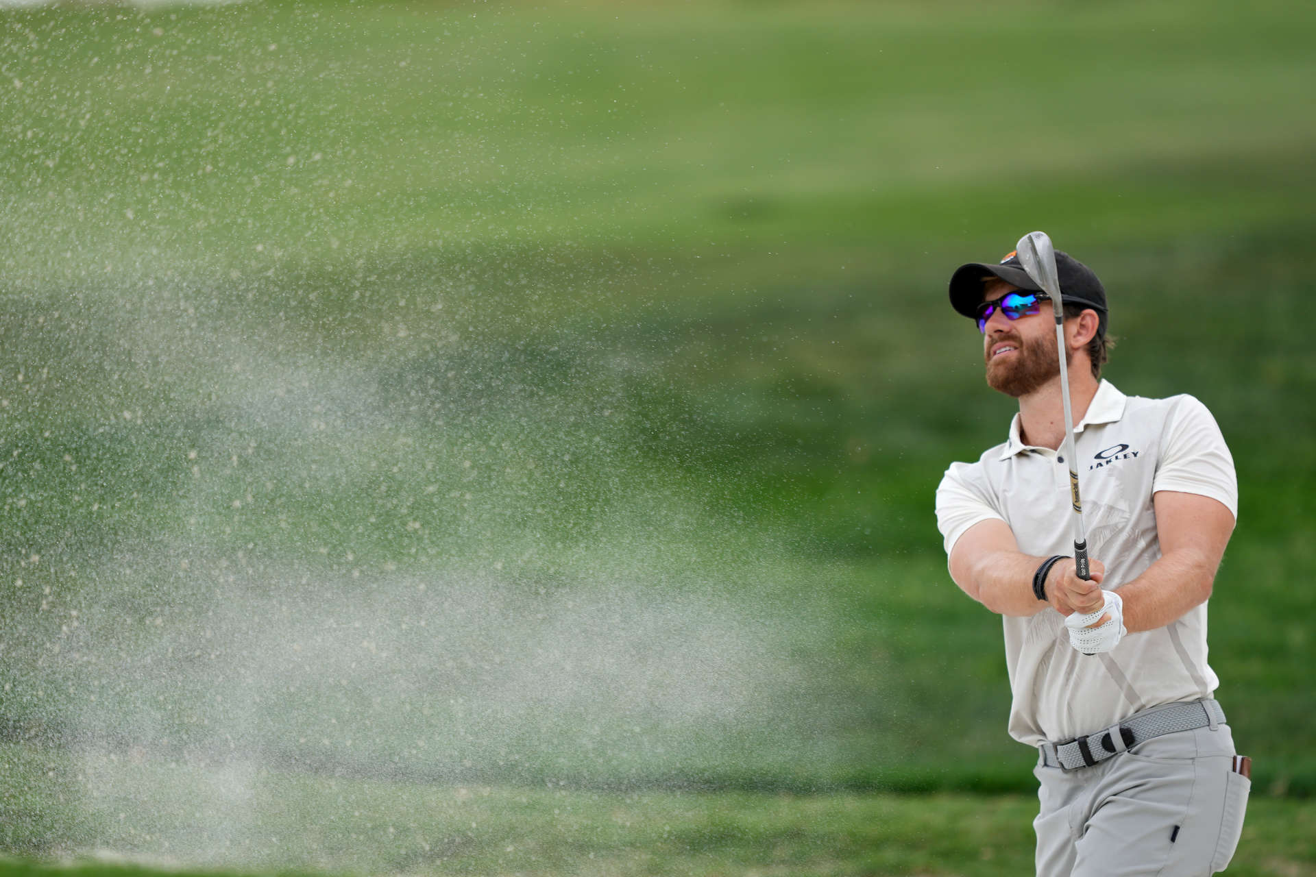 SAN ANTONIO, TEXAS - APRIL 01: Patrick Rodgers of the United States plays his shot from the bunker on the 18th hole during the third round of the Valero Texas Open at TPC San Antonio on April 01, 2023 in San Antonio, Texas. (Photo by Alex Bierens de Haan/Getty Images)