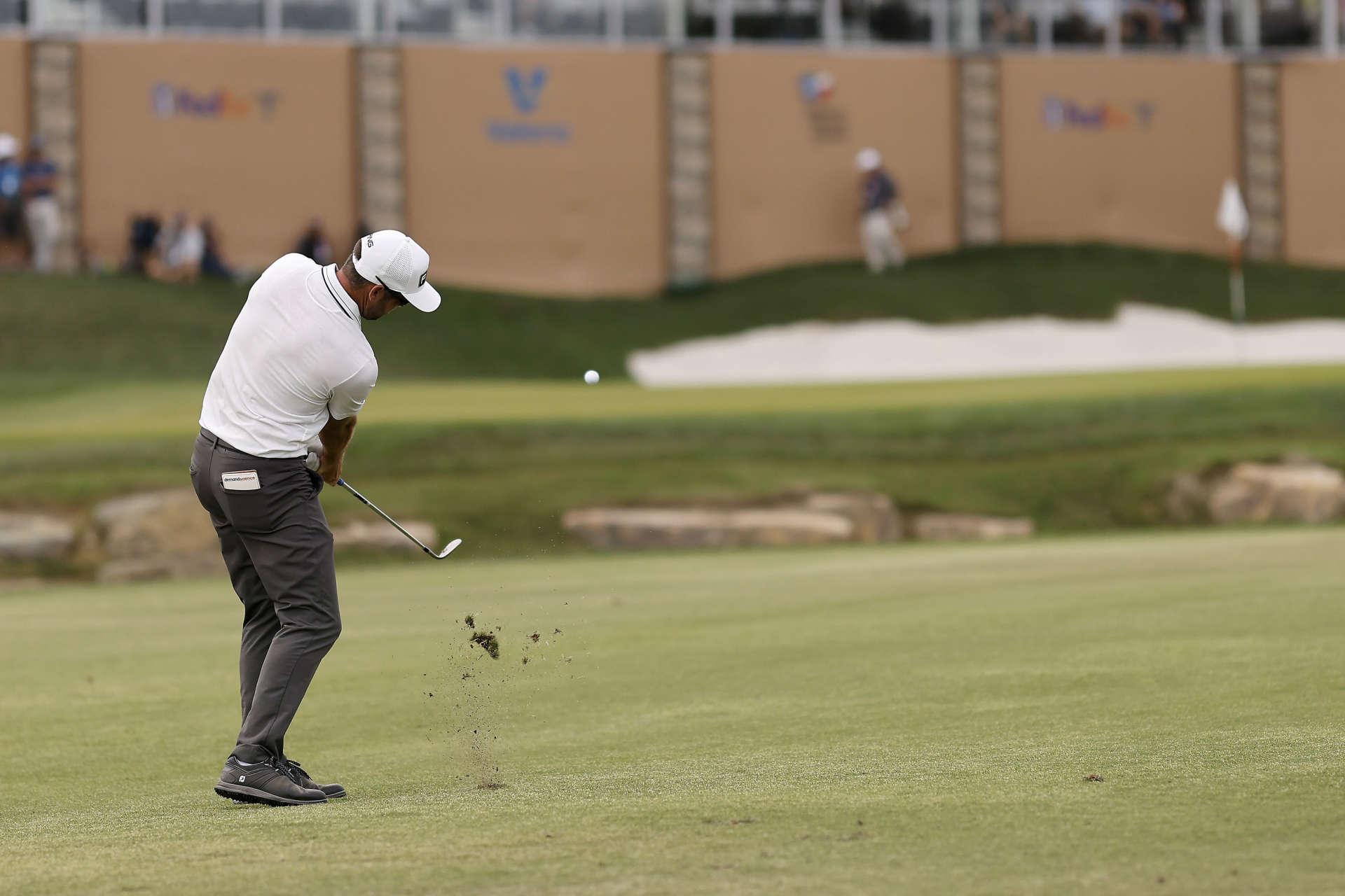 SAN ANTONIO, TEXAS - APRIL 01: Corey Conners of Canada plays his shot on the 18th hole during the third round of the Valero Texas Open at TPC San Antonio on April 01, 2023 in San Antonio, Texas. (Photo by Mike Mulholland/Getty Images)