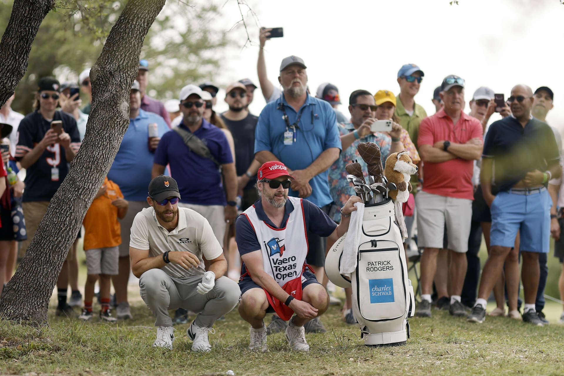 SAN ANTONIO, TEXAS - APRIL 01: Patrick Rodgers of the United States and his caddie line up a shot on the 18th hole during the third round of the Valero Texas Open at TPC San Antonio on April 01, 2023 in San Antonio, Texas. (Photo by Mike Mulholland/Getty Images)