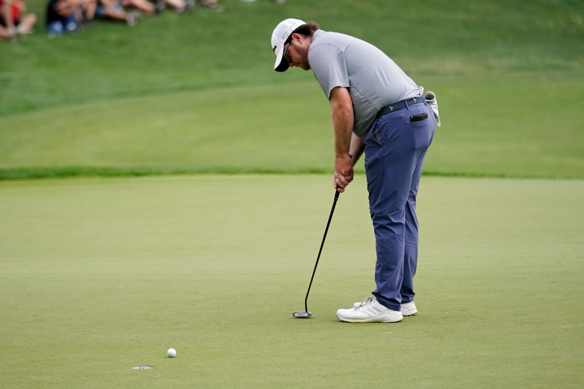 SAN ANTONIO, TEXAS - APRIL 01: Harry Higgs of the United States putts on the 18th green during the third round of the Valero Texas Open at TPC San Antonio on April 01, 2023 in San Antonio, Texas. (Photo by Alex Bierens de Haan/Getty Images)