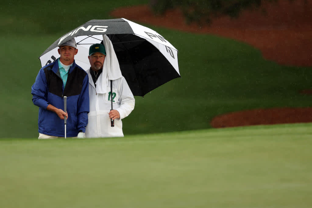 AUGUSTA, GEORGIA - APRIL 08: Amateur Sam Bennett of the United States talks with his caddie Brian Kortan on the seventh hole during the third round of the 2023 Masters Tournament at Augusta National Golf Club on April 08, 2023 in Augusta, Georgia. (Photo by Patrick Smith/Getty Images)
