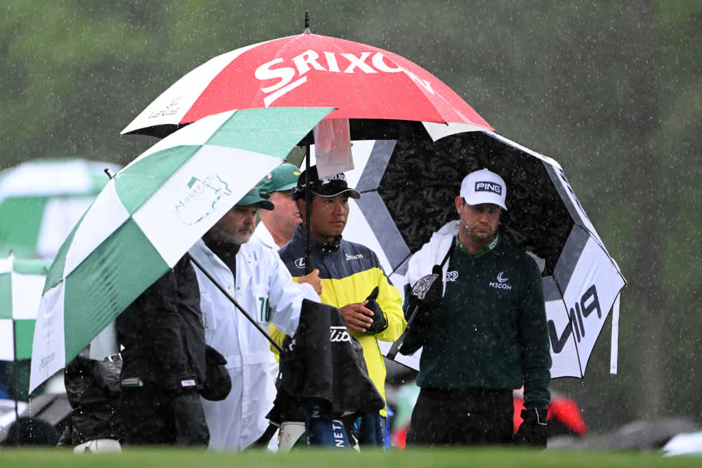 AUGUSTA, GEORGIA - APRIL 08: Hideki Matsuyama of Japan and Harris English of the United States look on from the 12th tee during the third round of the 2023 Masters Tournament at Augusta National Golf Club on April 08, 2023 in Augusta, Georgia. (Photo by Ross Kinnaird/Getty Images)