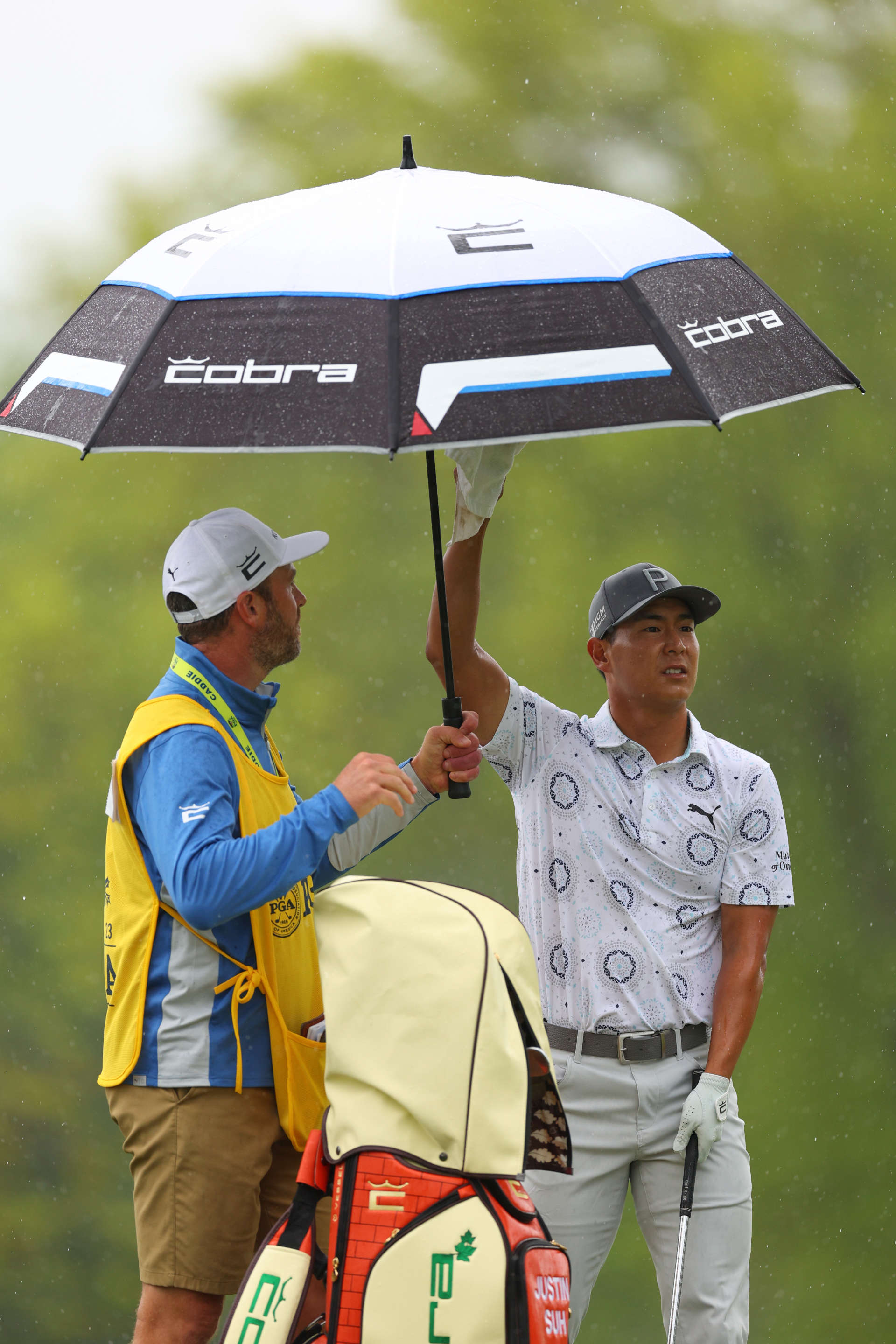 Justin Suh und sein Caddie