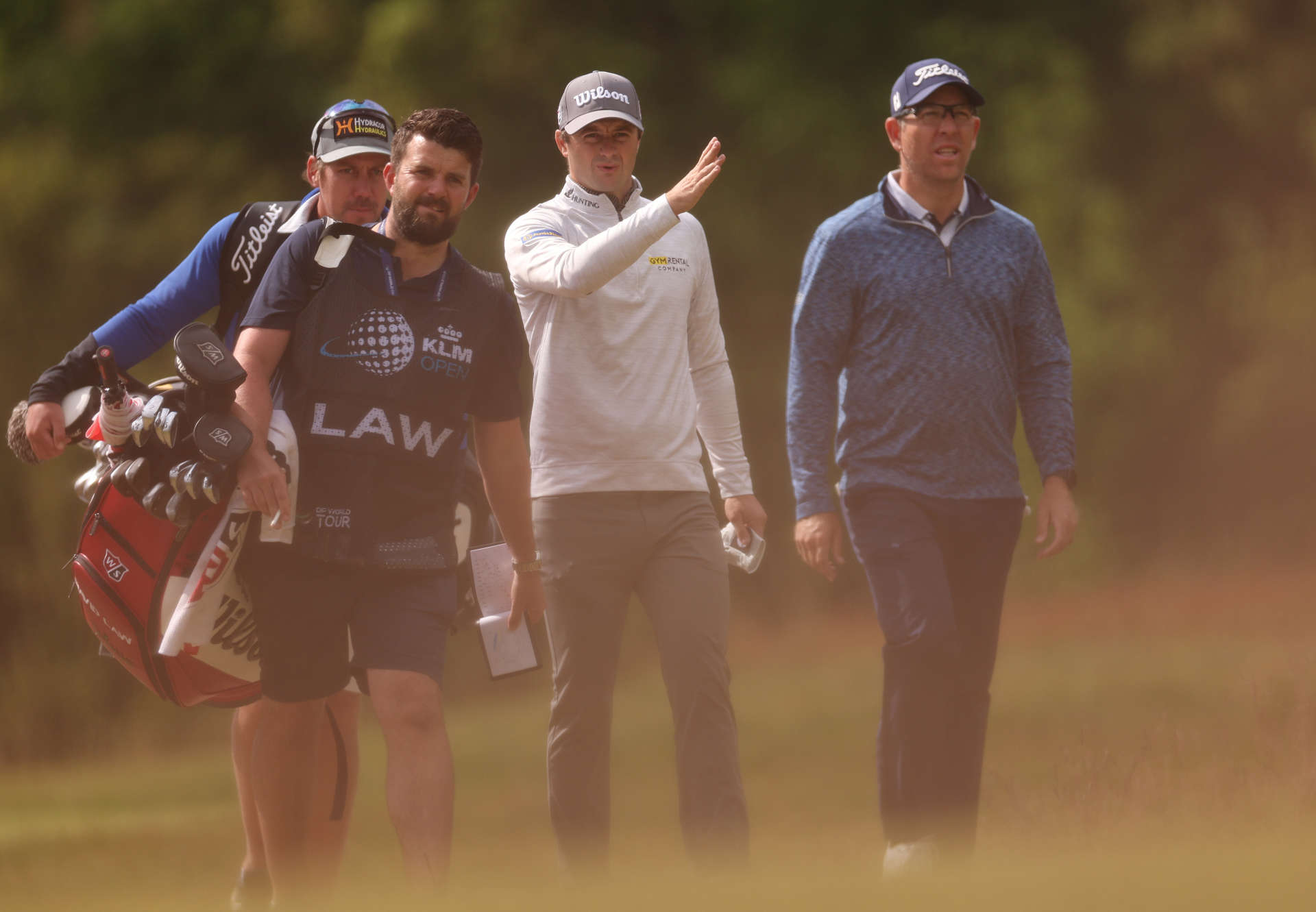 CROMVOIRT, NETHERLANDS - MAY 25: David Law of Scotland and Oliver Bekker of South Africa walk with their caddies on the seventh hole during Day One of the KLM Open at Bernardus Golf on May 25, 2023 in Netherlands. (Photo by Dean Mouhtaropoulos/Getty Images)