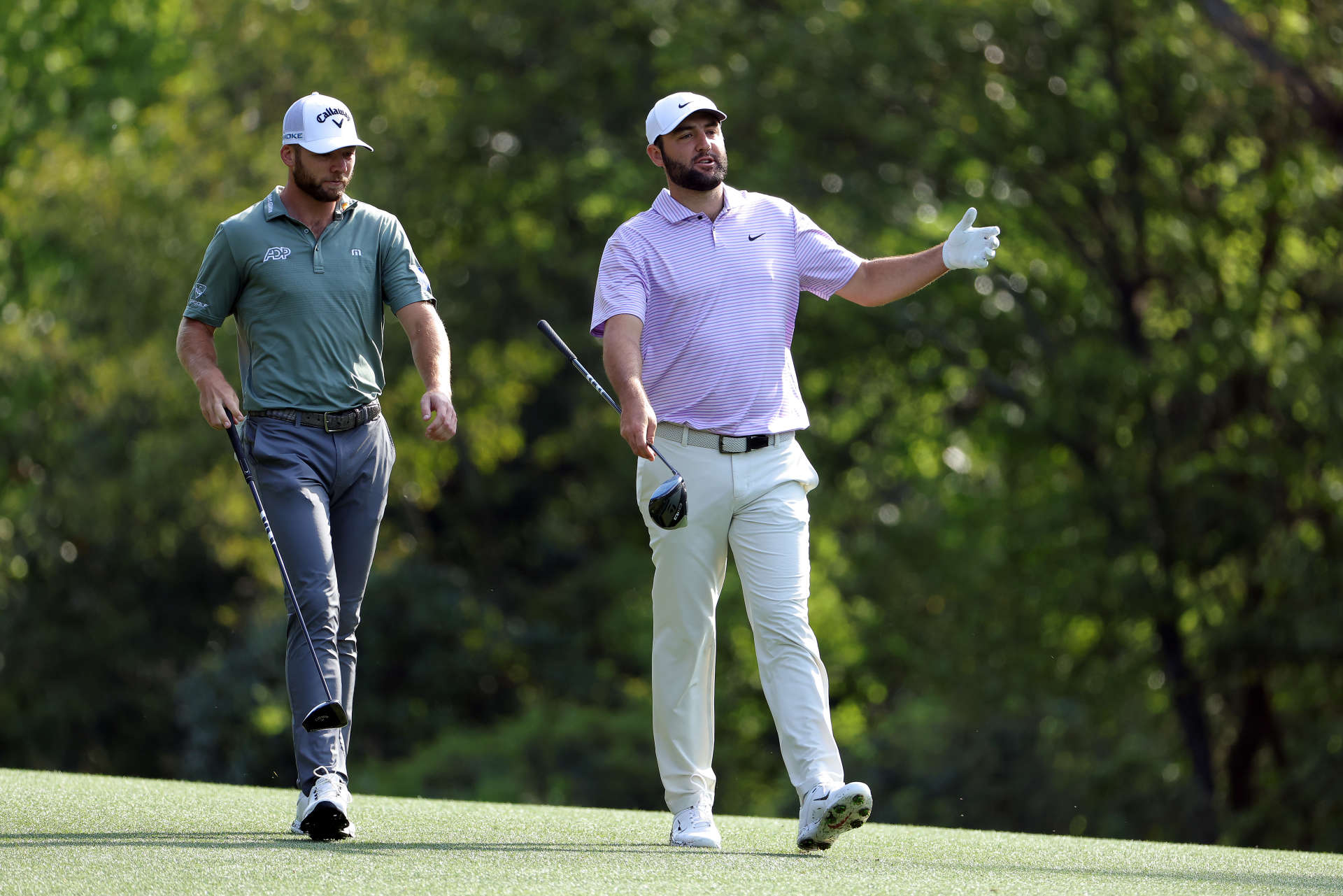 AUGUSTA, GEORGIA - APRIL 10: Sam Burns of the United States and Scottie Scheffler of the United States walk the 11th fairway during a practice round prior to the 2024 Masters Tournament at Augusta National Golf Club on April 10, 2024 in Augusta, Georgia. (Photo by Jamie Squire/Getty Images) (Photo by Jamie Squire/Getty Images)