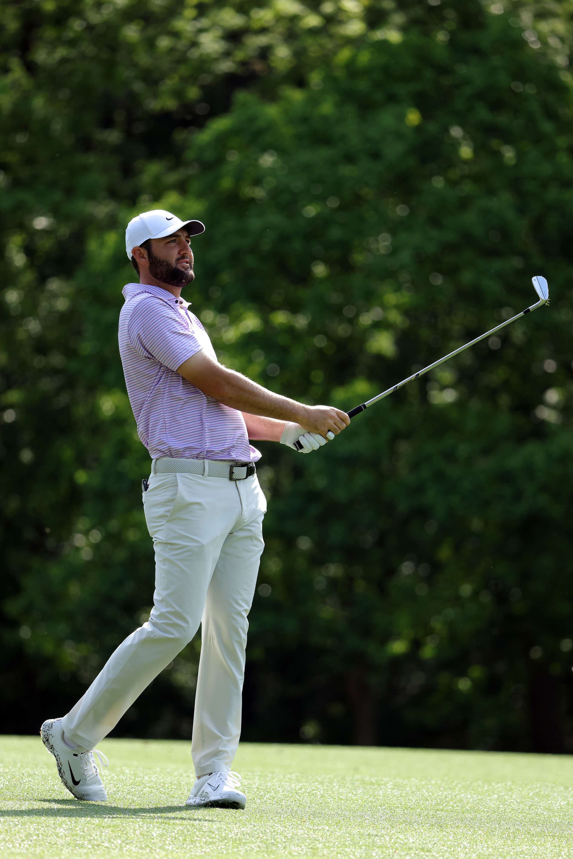 AUGUSTA, GEORGIA - APRIL 10: Scottie Scheffler of the United States follows his shot from the 11th hole during a practice round prior to the 2024 Masters Tournament at Augusta National Golf Club on April 10, 2024 in Augusta, Georgia. (Photo by Jamie Squire/Getty Images) (Photo by Jamie Squire/Getty Images)