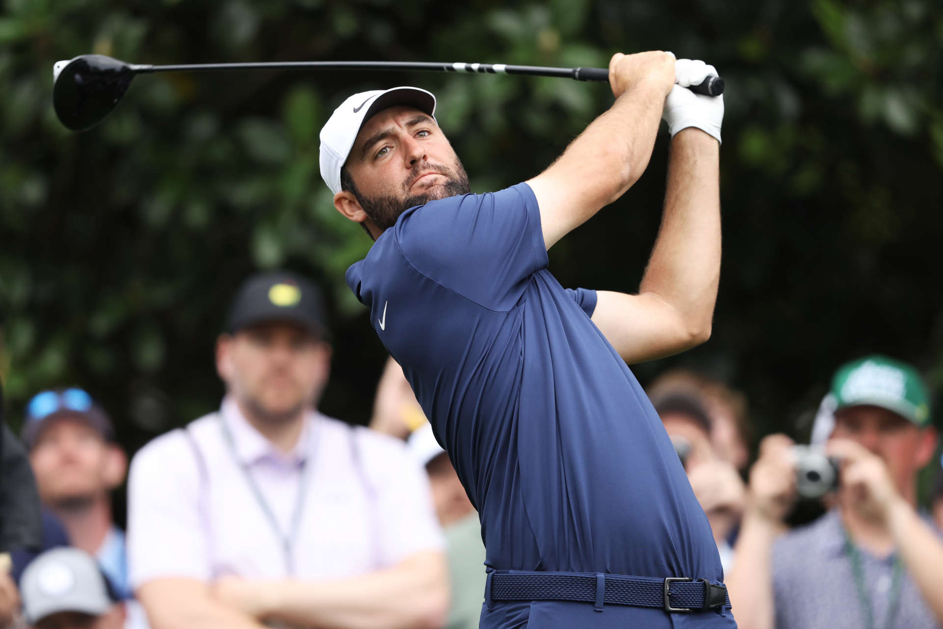 AUGUSTA, GEORGIA - APRIL 09: Scottie Scheffler of the United States plays his shot from the ninth tee during a practice round prior to the 2024 Masters Tournament at Augusta National Golf Club on April 09, 2024 in Augusta, Georgia. (Photo by Warren Little/Getty Images)