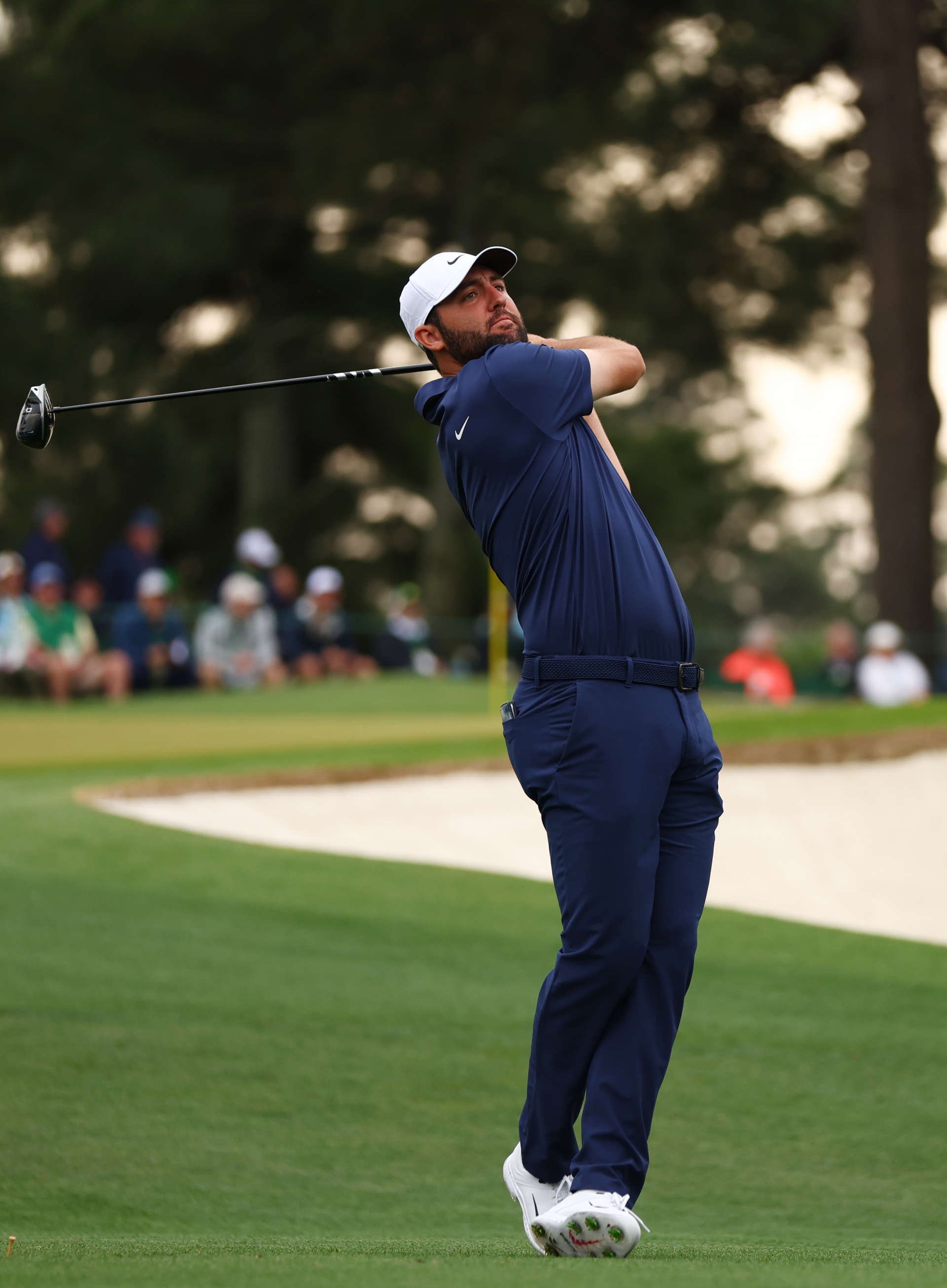 AUGUSTA, GEORGIA - APRIL 09: Scottie Scheffler of the United States hits his shot from the third tee during a practice round prior to the 2024 Masters Tournament at Augusta National Golf Club on April 09, 2024 in Augusta, Georgia. (Photo by Maddie Meyer/Getty Images)
