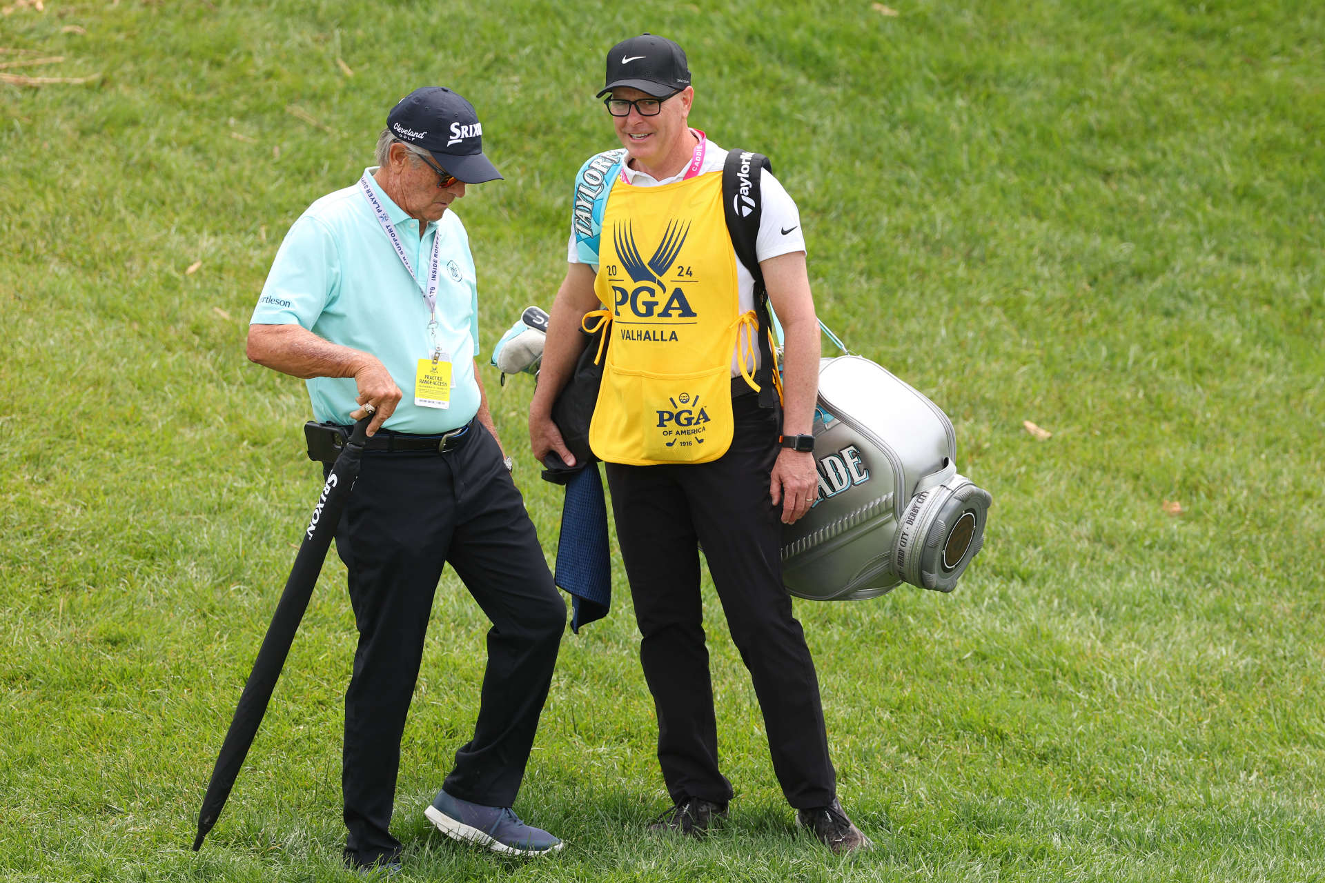 LOUISVILLE, KENTUCKY - MAY 18: Coach Randy Smith and Brad Payne, caddie of Scottie Scheffler of the United States are seen on the course during the third round of the 2024 PGA Championship at Valhalla Golf Club on May 18, 2024 in Louisville, Kentucky. (Photo by Andrew Redington/Getty Images)