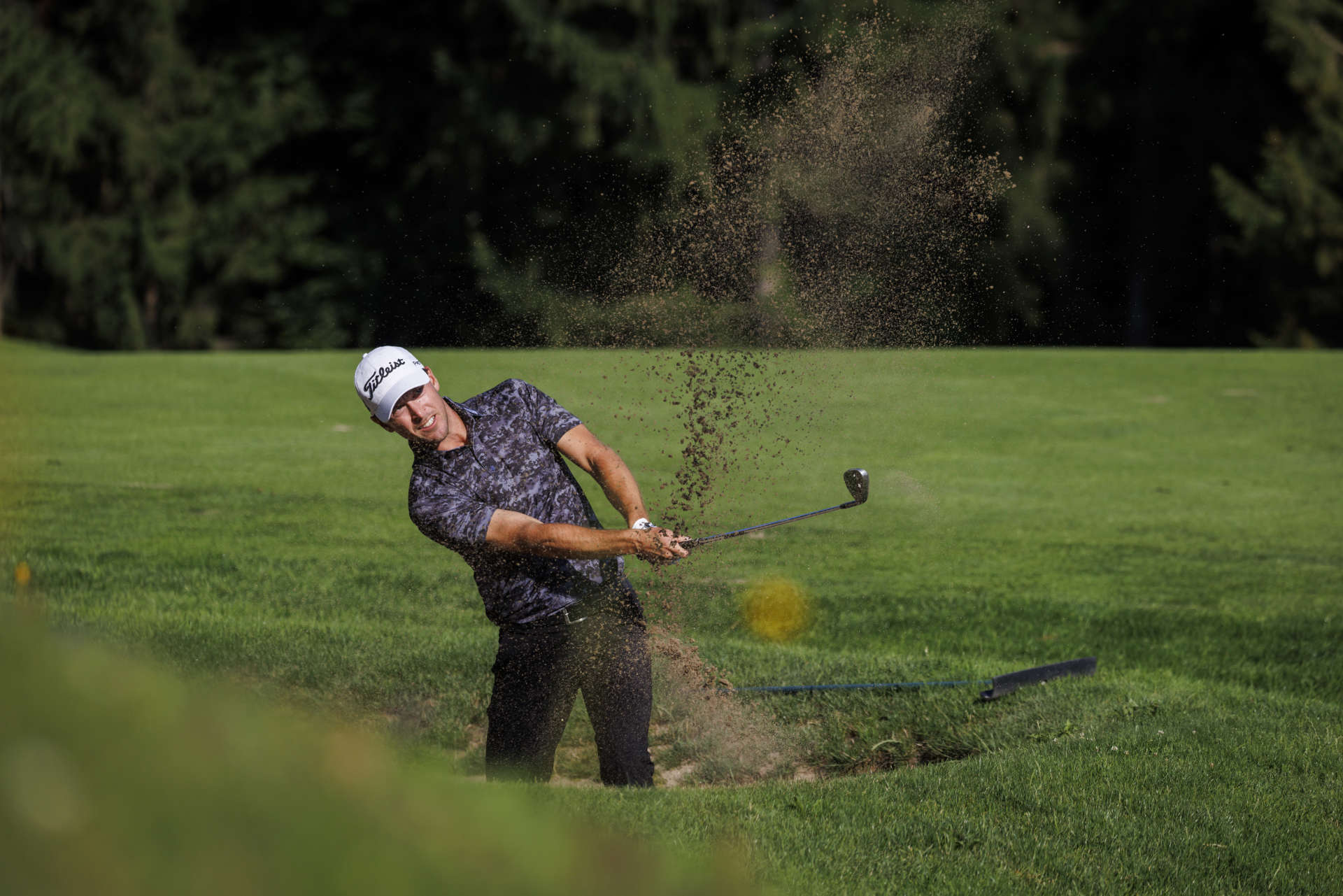 RAMSAU, AUSTRIA - JULY 19: Aron Zemmer of Italy hits his second shot out of a bunker at the eleventh hole during day two of the Euram Bank Open at GC Adamstal on July 19, 2024 in Ramsau, Austria. (Photo by Jan Hetfleisch/Getty Images)