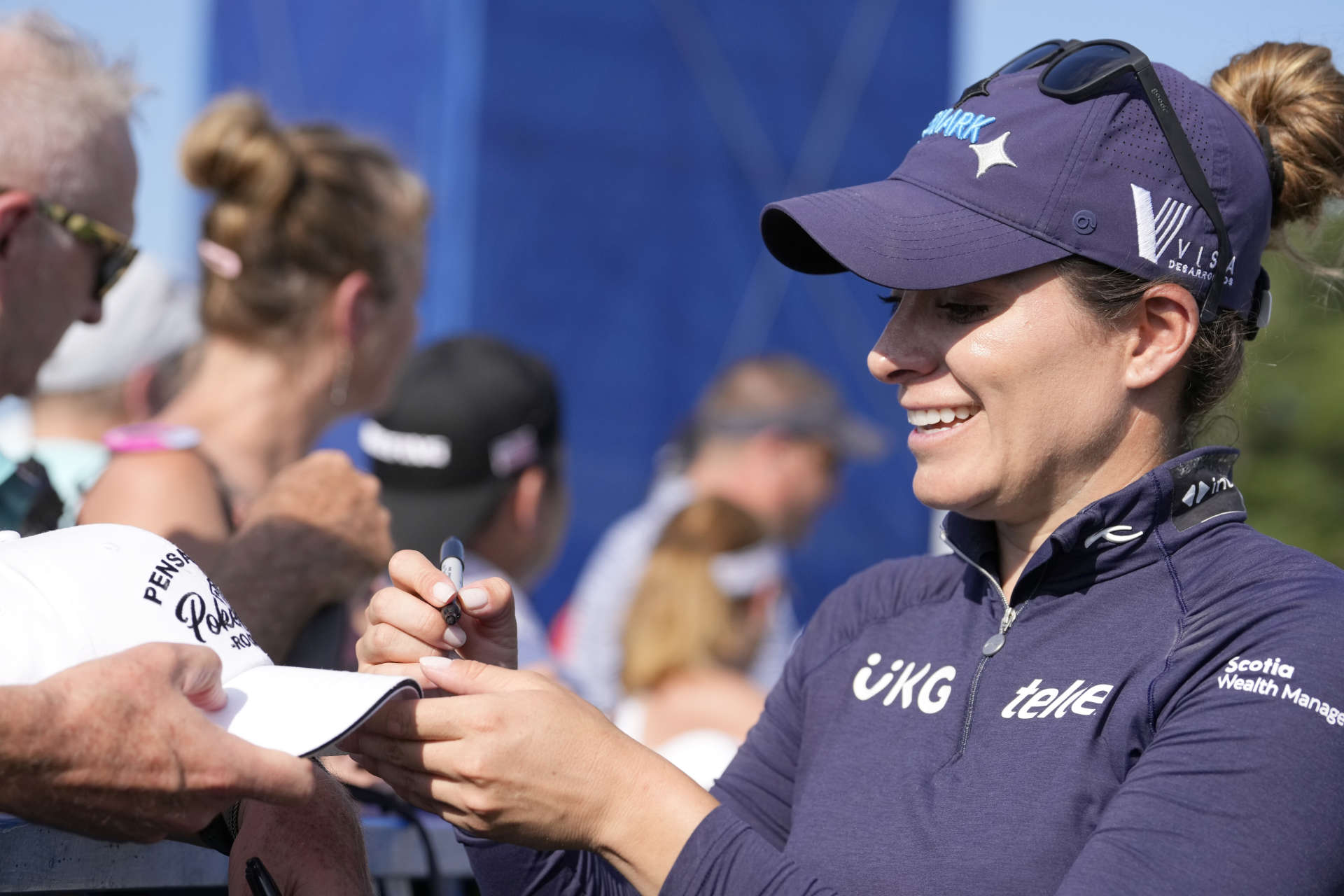 SYLVANIA, OHIO - JULY 19: Gaby Lopez of Mexico signs autographs for fans after the second round of the Dana Open at Highland Meadows Golf Club on July 19, 2024 in Sylvania, Ohio. (Photo by Raj Mehta/Getty Images)