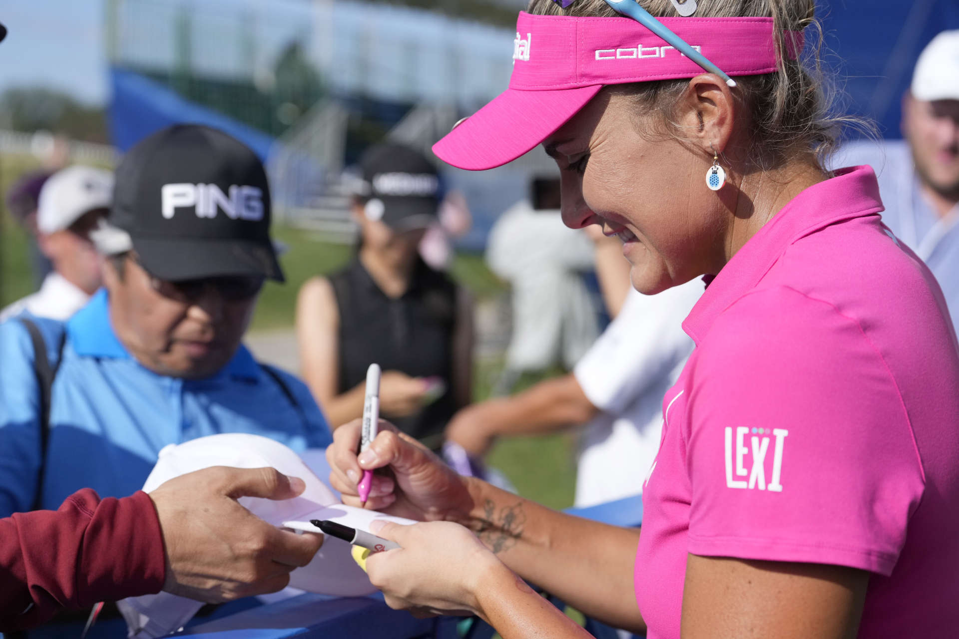 SYLVANIA, OHIO - JULY 19: Lexi Thompson of the United States signs autographs for fans after the second round of the Dana Open at Highland Meadows Golf Club on July 19, 2024 in Sylvania, Ohio. (Photo by Raj Mehta/Getty Images)