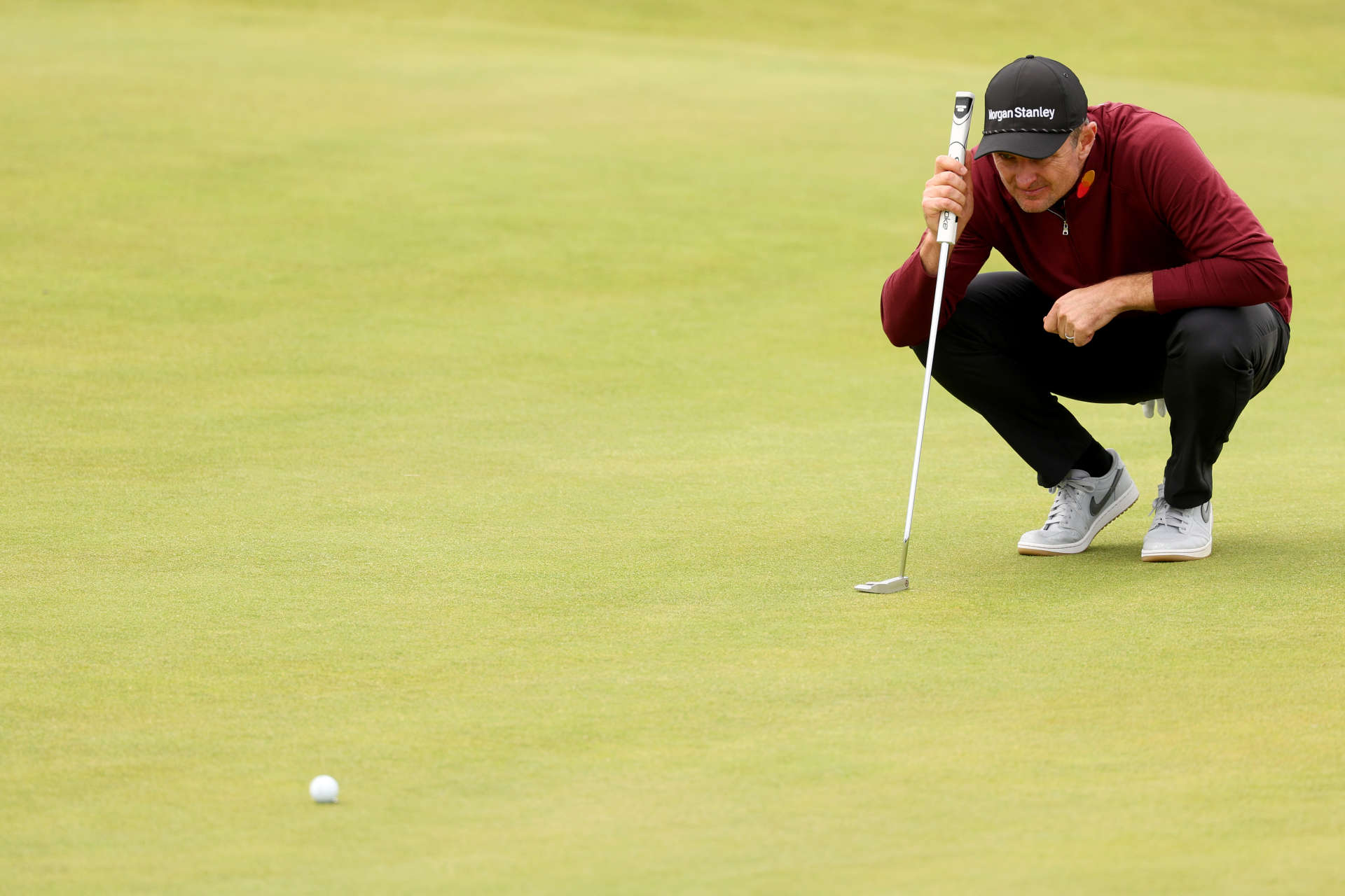 TROON, SCOTLAND - JULY 21: Justin Rose of England lines up a putt on the fifth green during day four of The 152nd Open championship at Royal Troon on July 21, 2024 in Troon, Scotland. (Photo by Kevin C. Cox/Getty Images)