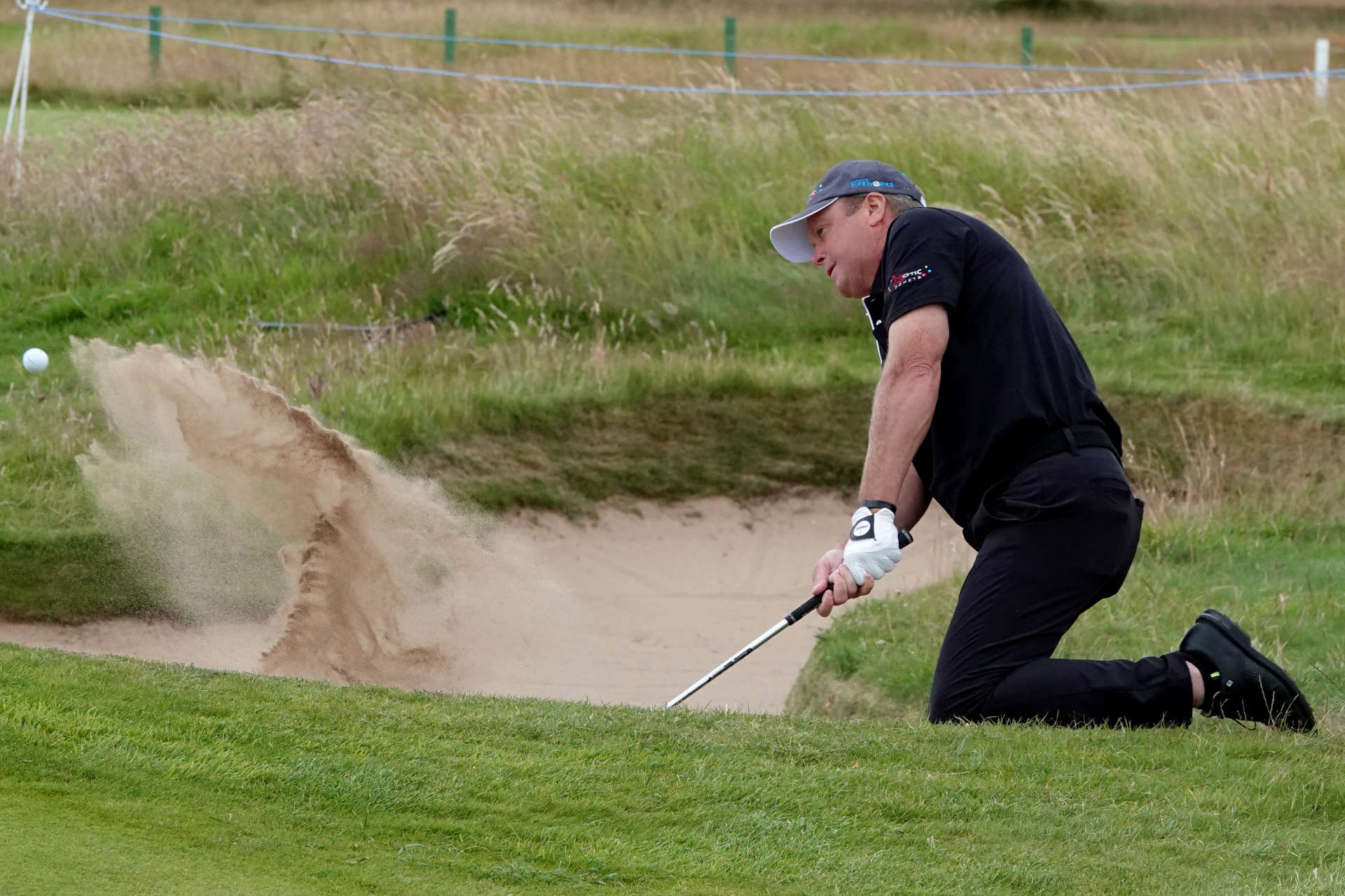 CARNOUSTIE, SCOTLAND - JULY 25: Doug McGuigan of Scotland in action during day one of the Senior Open Championship presented by Rolex at Carnoustie Golf Links on July 25, 2024 in Carnoustie, Scotland.  (Photo by Phil Inglis/Getty Images)