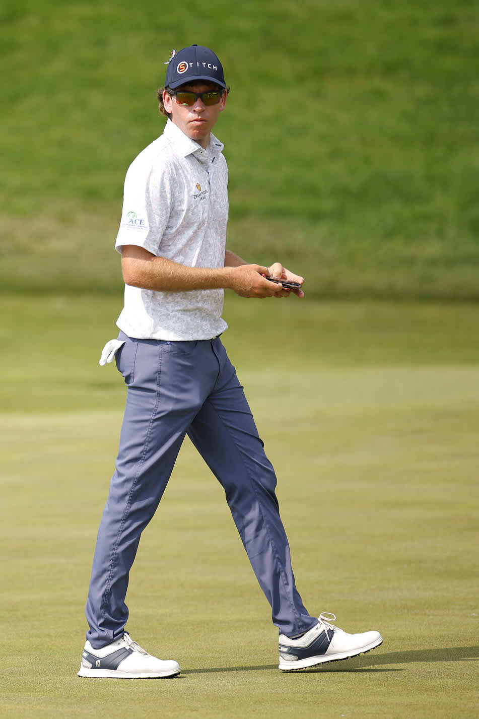 BLAINE, MINNESOTA - JULY 26: Ben Kohles of the United States looks on from the ninth green during the second round of the 3M Open at TPC Twin Cities on July 26, 2024 in Blaine, Minnesota. (Photo by Mike Ehrmann/Getty Images)
