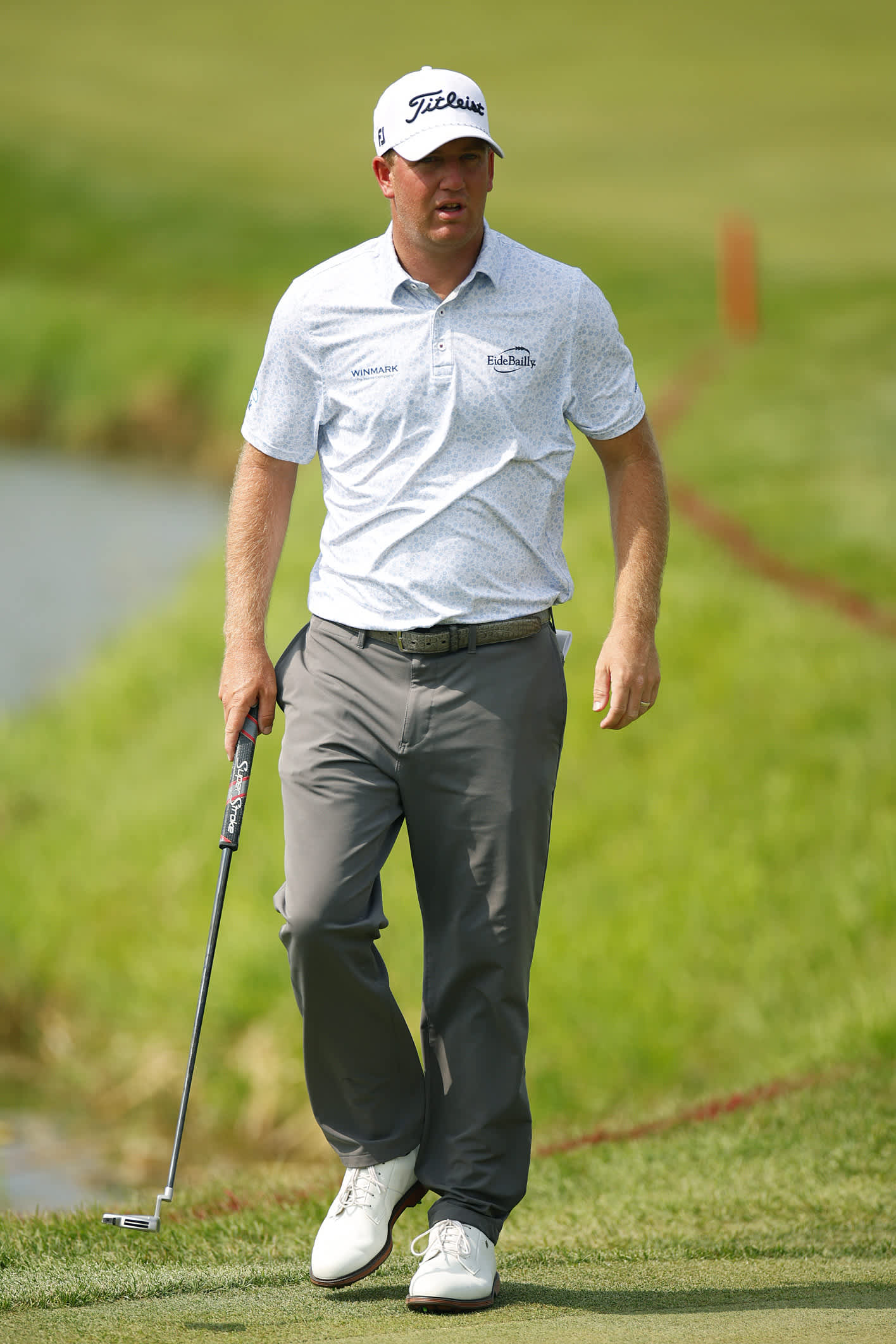 BLAINE, MINNESOTA - JULY 26: Tom Hoge of the United States looks on from the ninth green during the second round of the 3M Open at TPC Twin Cities on July 26, 2024 in Blaine, Minnesota. (Photo by Mike Ehrmann/Getty Images)