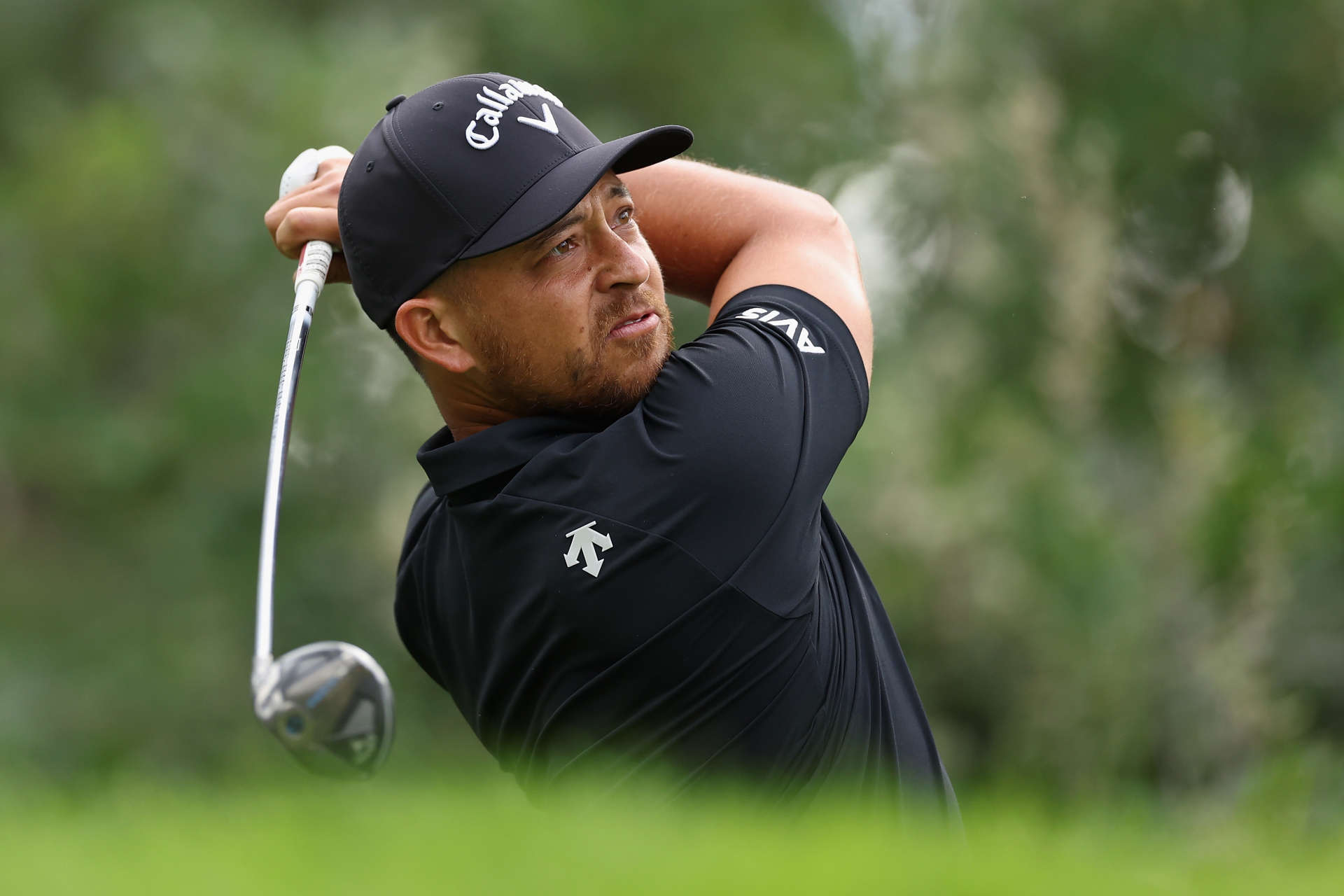 CASTLE ROCK, COLORADO - AUGUST 22: Xander Schauffele of the United States plays a tee shot on the second hole during the first round of the BMW Championship at Castle Pines Golf Club on August 22, 2024 in Castle Rock, Colorado. (Photo by Christian Petersen/Getty Images)