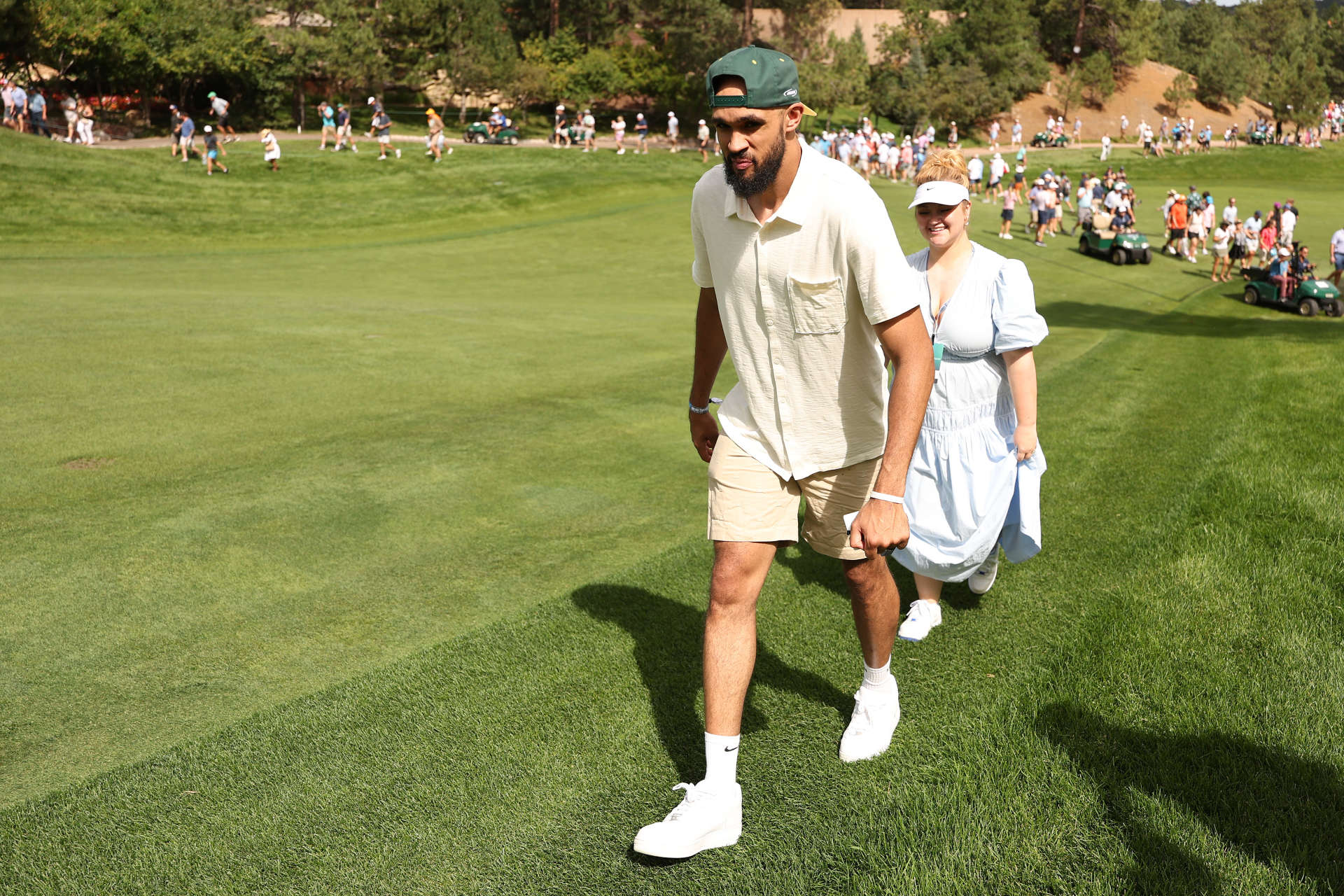 CASTLE ROCK, COLORADO - AUGUST 22: Derrick White of the Boston Celtics walks the course during the first round of the BMW Championship at Castle Pines Golf Club on August 22, 2024 in Castle Rock, Colorado. (Photo by Christian Petersen/Getty Images)