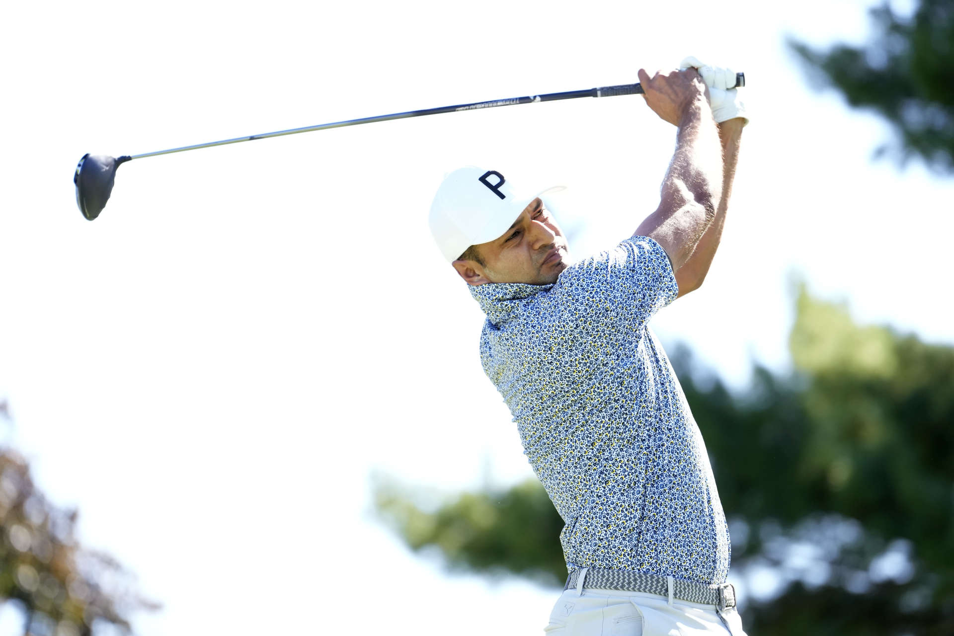 COLUMBUS, OHIO - SEPTEMBER 21: Julian Suri of the United States plays his shot from the 11th tee during the third round of the Nationwide Children's Hospital Championship 2024 at Ohio State University Golf Club on September 21, 2024 in Columbus, Ohio. (Photo by Raj Mehta/Getty Images)