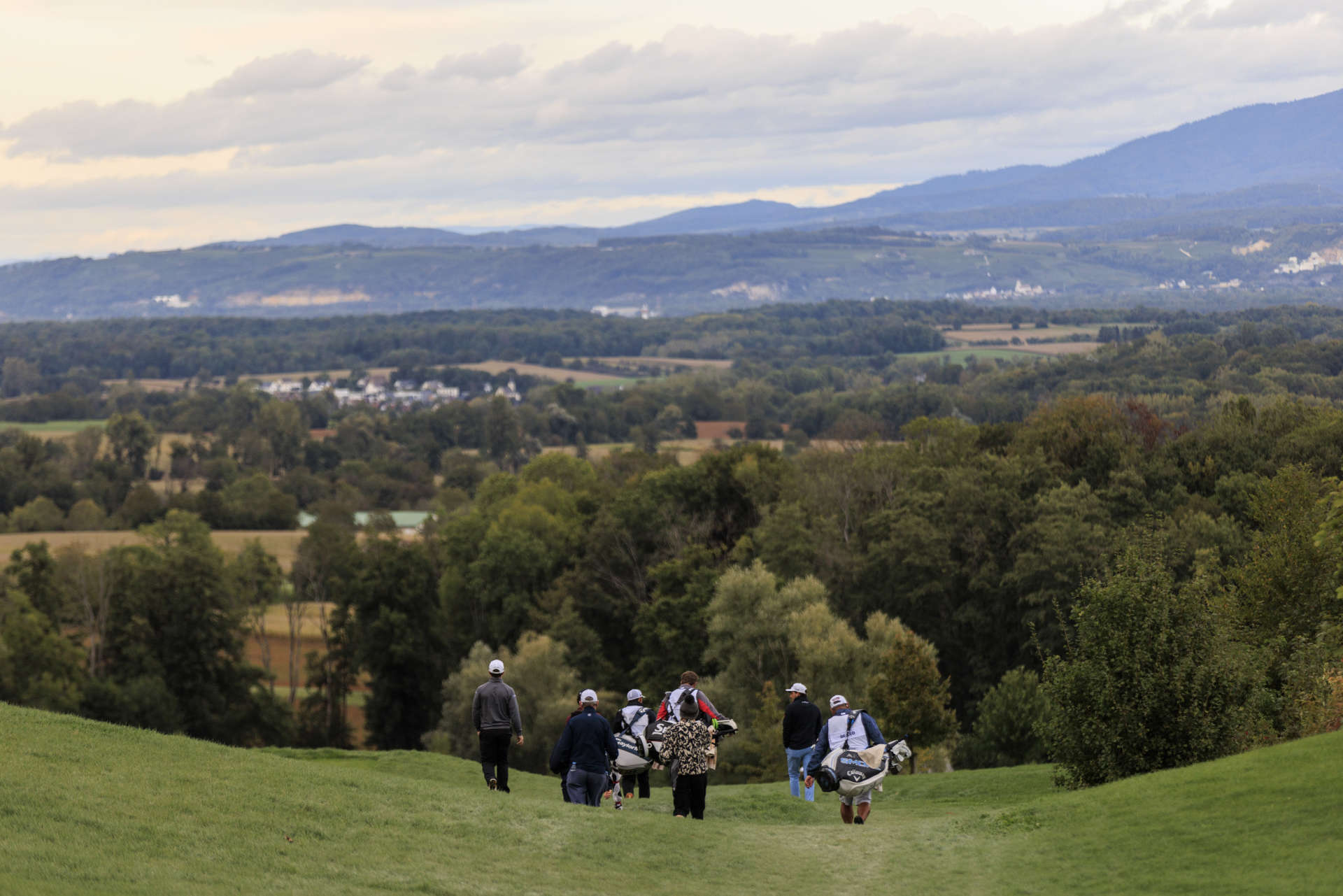 FOLGENSBOURG, FRANCE - SEPTEMBER 27: Players walk to their second shot on the second hole on day two of the Swiss Challenge 2024 at Golf Saint Apollinaire on September 27, 2024 in Folgensbourg, France. (Photo by Jan Hetfleisch/Getty Images)