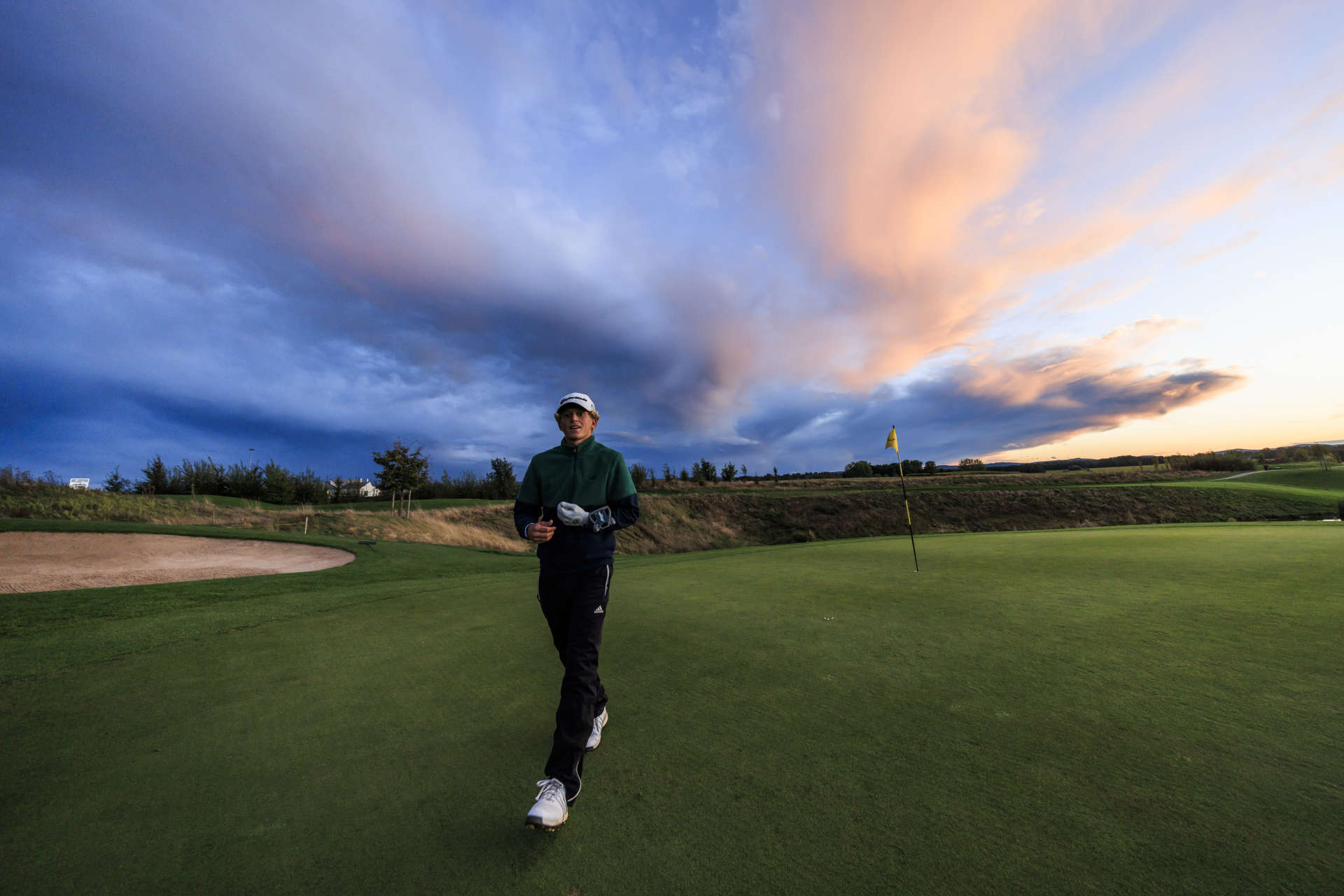 FOLGENSBOURG, FRANCE - SEPTEMBER 27: Martin Couvra of France leaves the twelfth green on day two of the Swiss Challenge 2024 at Golf Saint Apollinaire on September 27, 2024 in Folgensbourg, France. (Photo by Jan Hetfleisch/Getty Images)