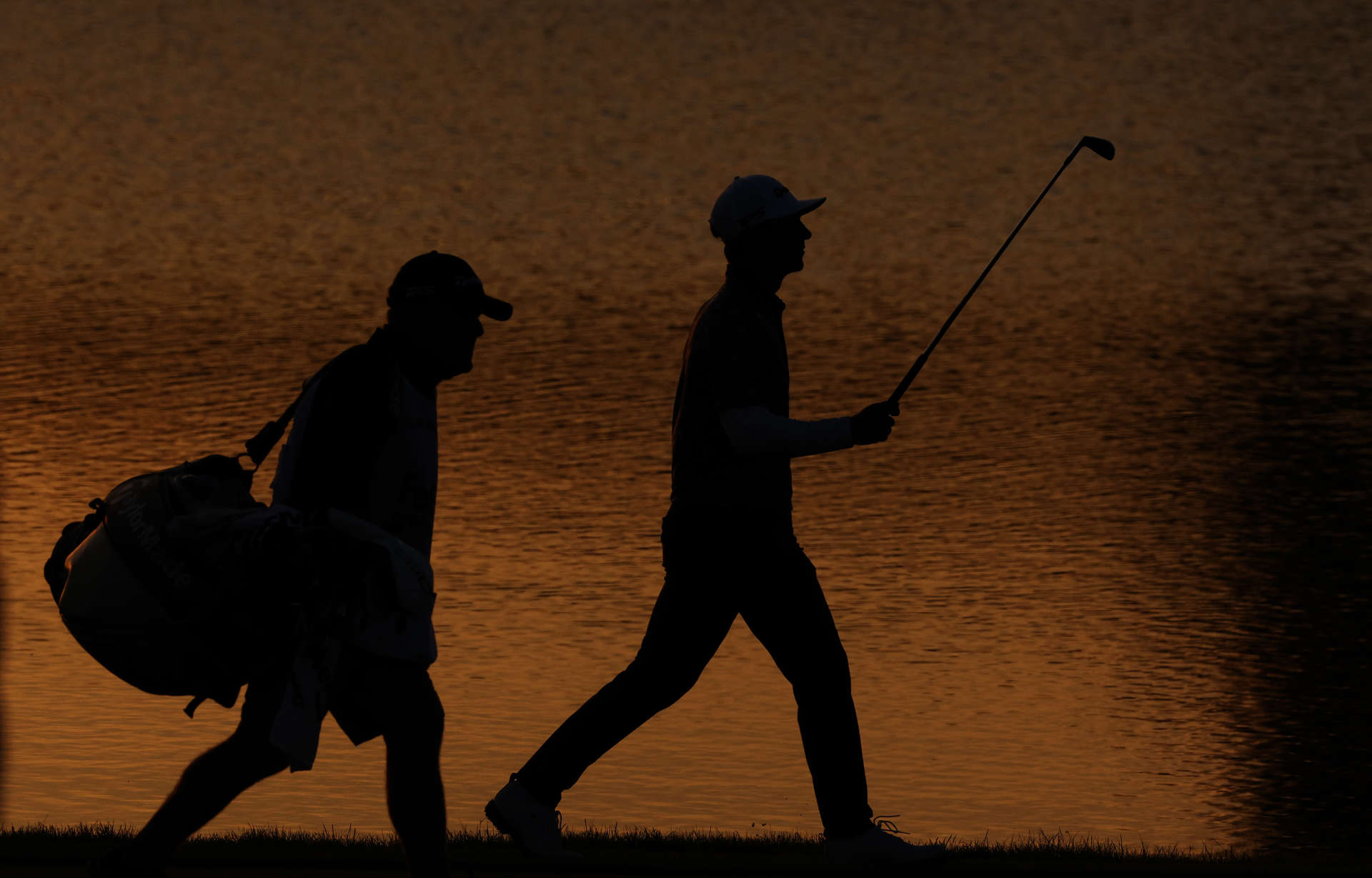 GUYANCOURT, FRANCE - OCTOBER 11: Thorbjorn Olesen of Denmark and caddie Dominic Bott walk to the 18th green during the second round of the FedEx Open de France 2024 at Le Golf National on October 11, 2024 in Guyancourt, France. (Photo by Warren Little/Getty Images)