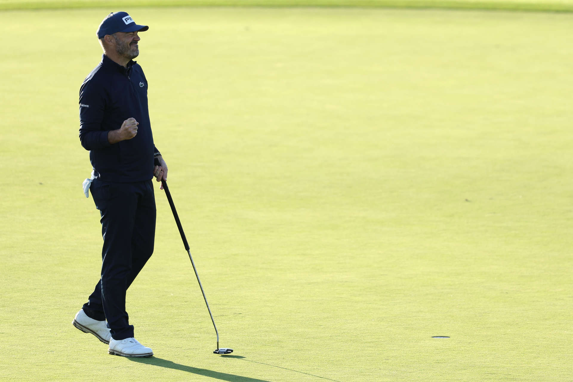 GUYANCOURT, FRANCE - OCTOBER 11: Gregory Havret of France celebrates after his putt on the 18th green on day two of the FedEx Open de France 2024 at Le Golf National on October 11, 2024 in Guyancourt, France. (Photo by Warren Little/Getty Images)