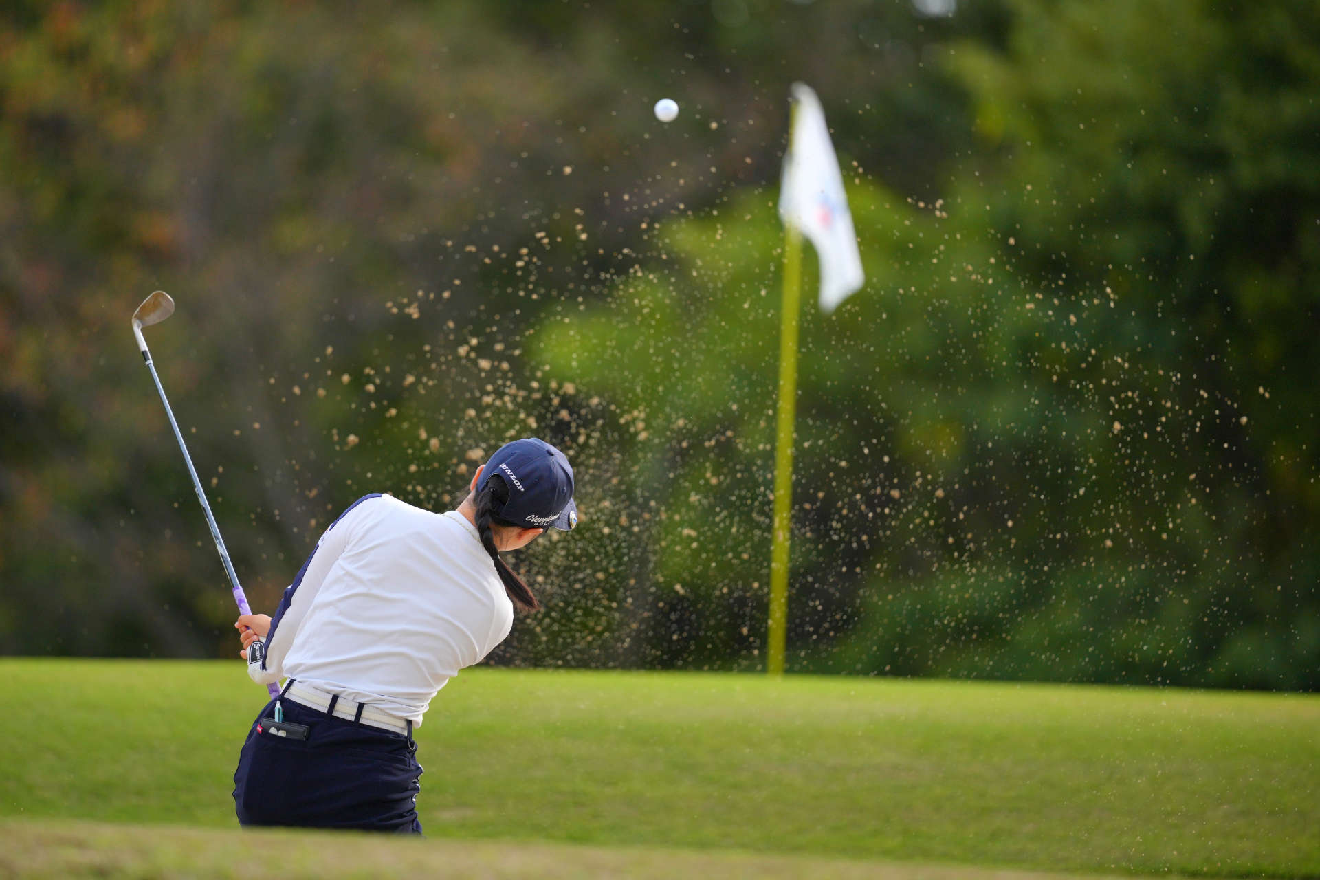 OTSU, JAPAN - OCTOBER 31: Amiyu Ozeki of Japan hits out from a bunker on the 7th hole during the first round of the TOTO Japan Classic 2024 at Seta Golf Course on October 31, 2024 in Otsu, Shiga, Japan. (Photo by Yoshimasa Nakano/Getty Images)