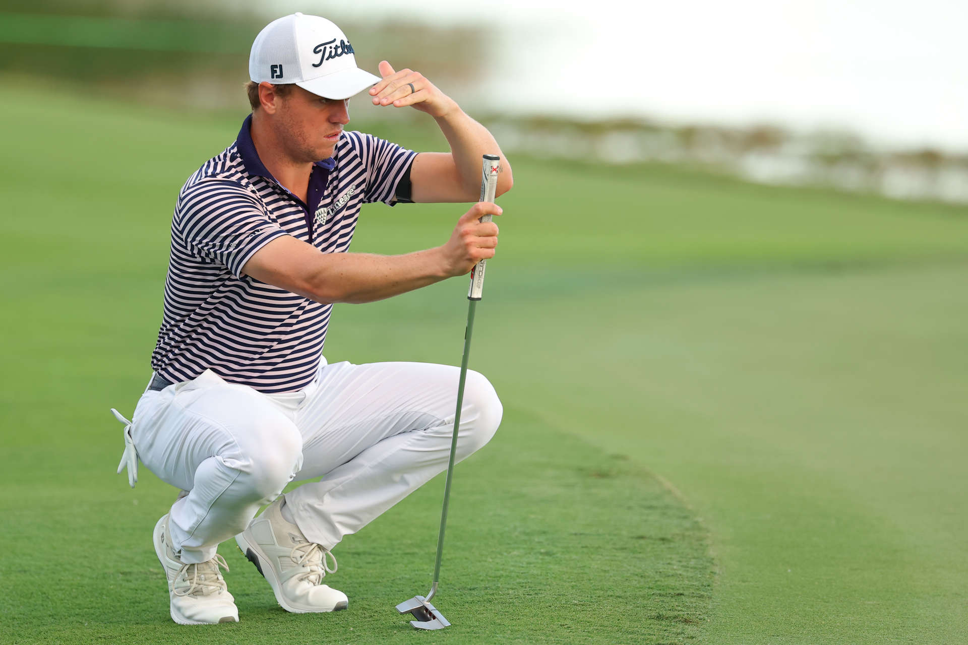 NASSAU, BAHAMAS - DECEMBER 07: Justin Thomas of the United States lines up a putt on the 18th green during the third round of the Hero World Challenge 2024 at Albany Golf Course on December 07, 2024 in Nassau, Bahamas. (Photo by Kevin C. Cox/Getty Images)