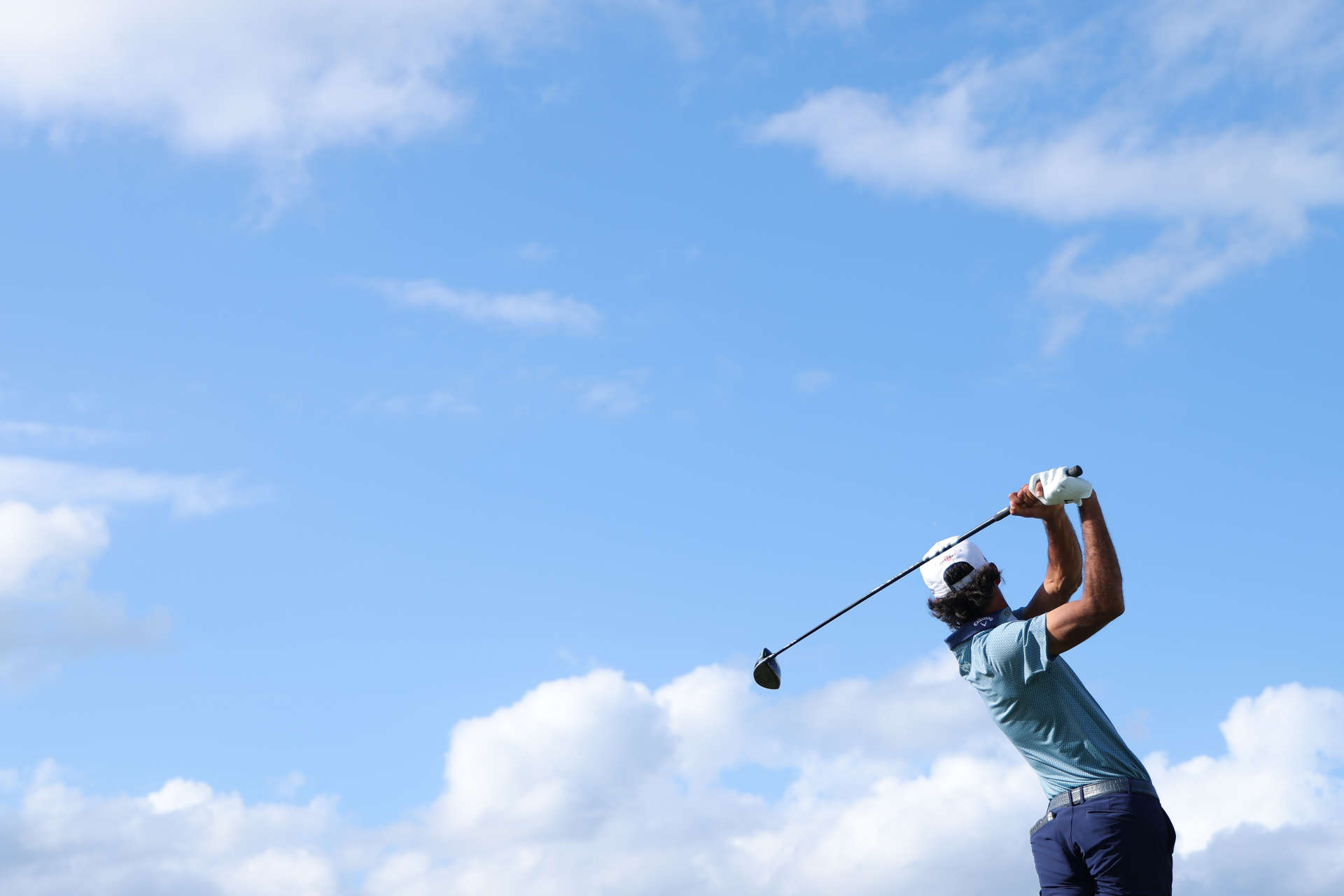 NASSAU, BAHAMAS - DECEMBER 07: Akshay Bhatia of the United States plays his shot from the ninth tee during the third round of the Hero World Challenge 2024 at Albany Golf Course on December 07, 2024 in Nassau, Bahamas. (Photo by Kevin C. Cox/Getty Images)