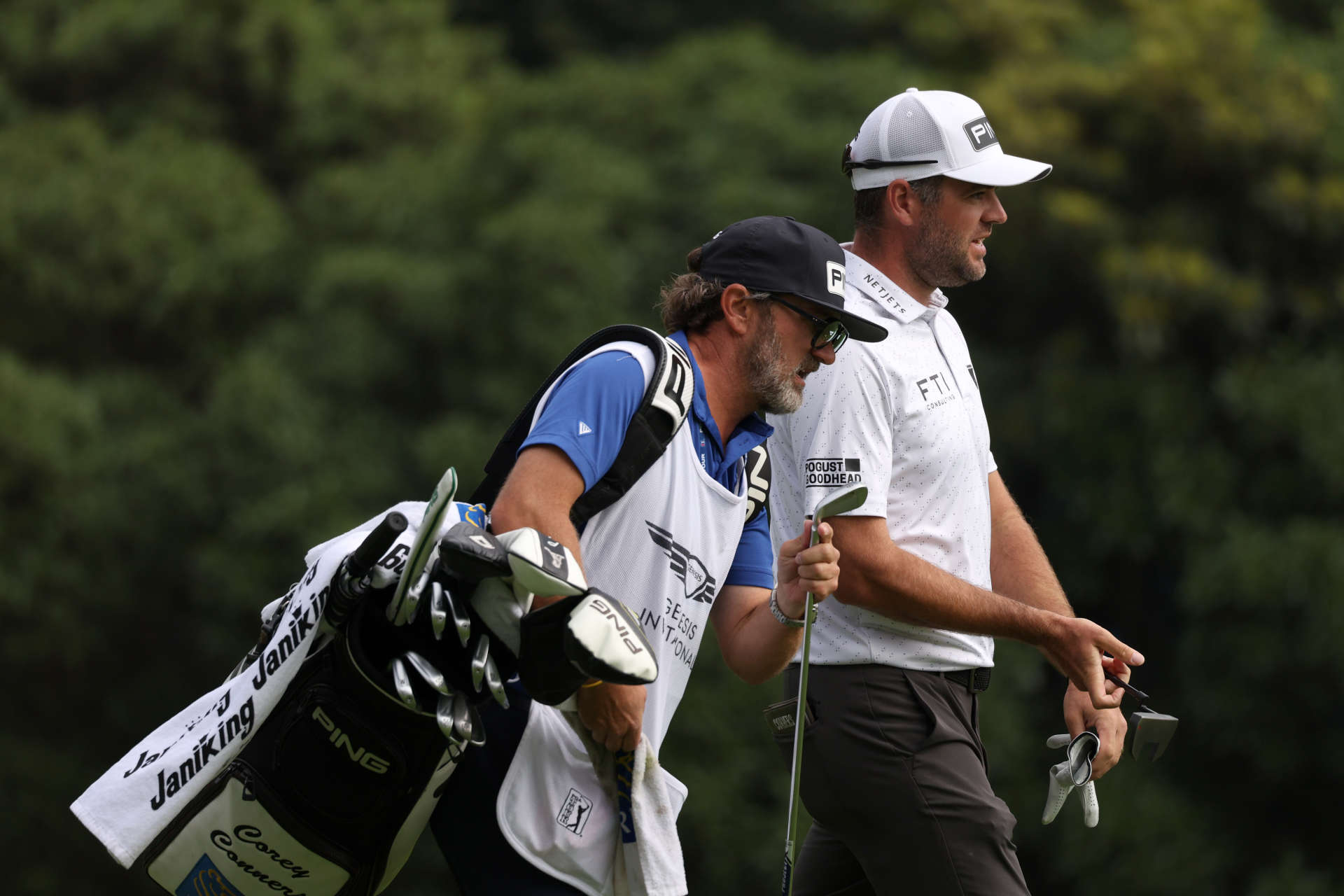 PACIFIC PALISADES, CALIFORNIA - FEBRUARY 17: Corey Conners of Canada and caddie Danny Sahl walk down the 13th hole during the third round of The Genesis Invitational at Riviera Country Club on February 17, 2024 in Pacific Palisades, California. (Photo by Harry How/Getty Images)