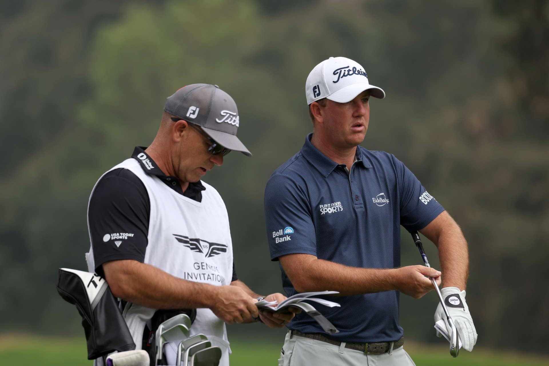 PACIFIC PALISADES, CALIFORNIA - FEBRUARY 17: Tom Hoge of the United States and his caddie James Edmondson prepare to play a shot on the 13th hole during the third round of The Genesis Invitational at Riviera Country Club on February 17, 2024 in Pacific Palisades, California. (Photo by Harry How/Getty Images)