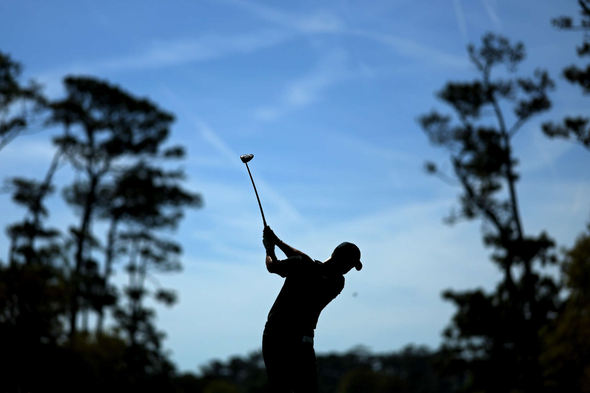 PONTE VEDRA BEACH, FLORIDA - MARCH 14: Rory McIlroy of Northern Ireland plays his shot from the fourth tee during the first round of THE PLAYERS Championship on the Stadium Course at TPC Sawgrass on March 14, 2024 in Ponte Vedra Beach, Florida. (Photo by Kevin C. Cox/Getty Images)