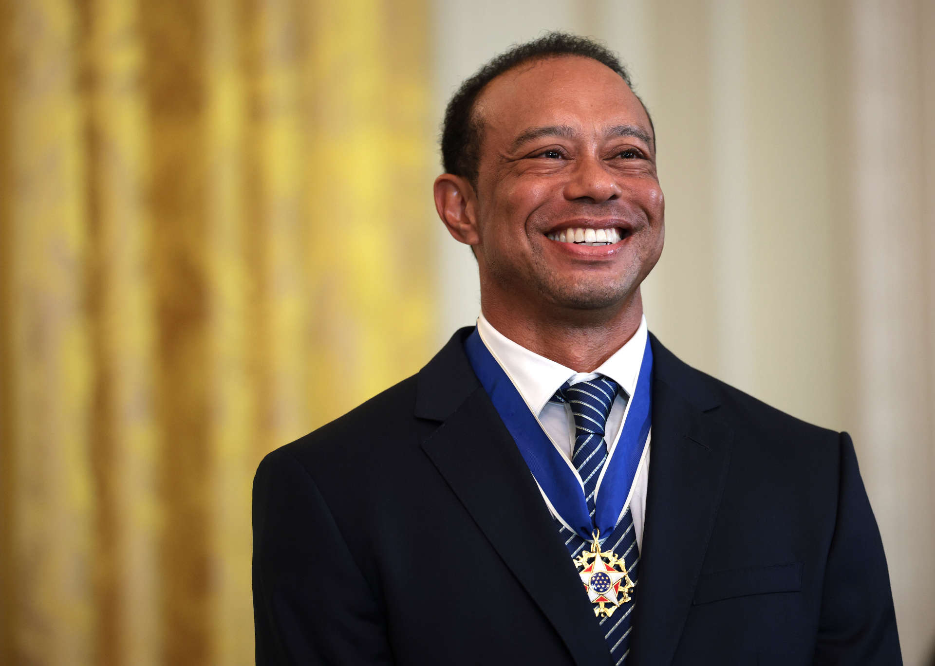 WASHINGTON, DC - FEBRUARY 20: Golf legend Tiger Woods attends a reception honoring Black History Month held by U.S. President Donald Trump in the East Room of the White House on February 20, 2025 in Washington, DC. The Black History Month celebration comes as Trump has signed a series of executive orders ending federal diversity, equity and inclusion (DEI) programs and cutting funding to schools and Universities that do not cut DEI programs. (Photo by Win McNamee/Getty Images)