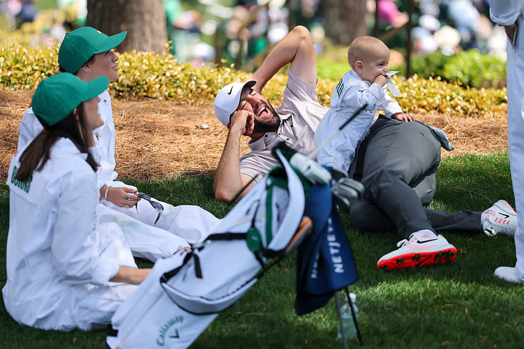 AUGUSTA, GEORGIA - APRIL 09: Scottie Scheffler of the United States reacts with Bennett Scheffler on the eighth hole during the Par Three Contest prior to the 2025 Masters Tournament at Augusta National Golf Club on April 09, 2025 in Augusta, Georgia. (Photo by Michael Reaves/Getty Images)