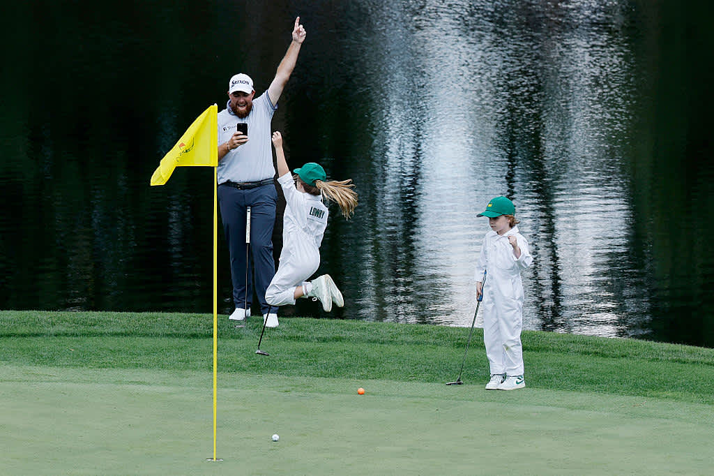 AUGUSTA, GEORGIA - APRIL 09: Shane Lowry of Ireland celebrates as his daughter, Iris Lowry, holes out on the ninth green during the Par Three Contest prior to the 2025 Masters Tournament at Augusta National Golf Club on April 09, 2025 in Augusta, Georgia. (Photo by Harry How/Getty Images)