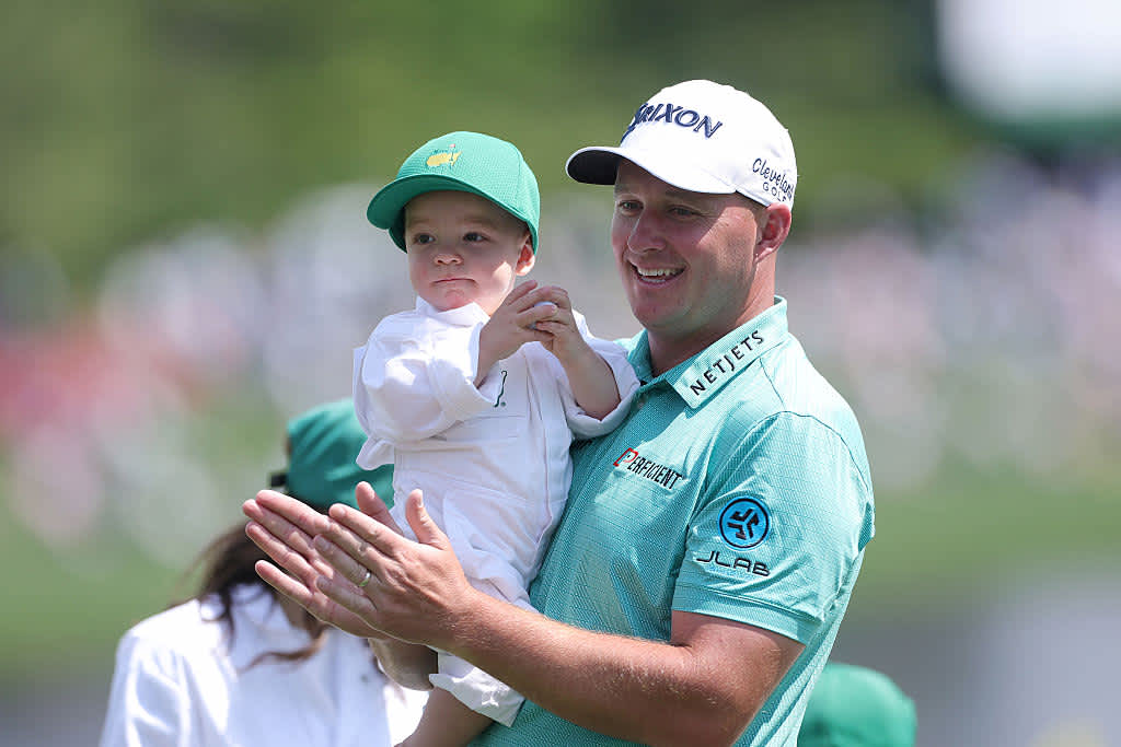 AUGUSTA, GEORGIA - APRIL 09: Sepp Straka of Austria holds son Leo on the second hole during the Par Three Contest prior to the 2025 Masters Tournament at Augusta National Golf Club on April 09, 2025 in Augusta, Georgia. (Photo by Andrew Redington/Getty Images)