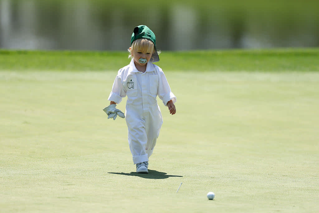 AUGUSTA, GEORGIA - APRIL 09: Son of Christiaan Bezuidenhout of South Africa, John Bezuidenhout, walks on course during the Par Three Contest prior to the 2025 Masters Tournament at Augusta National Golf Club on April 09, 2025 in Augusta, Georgia. (Photo by Richard Heathcote/Getty Images)