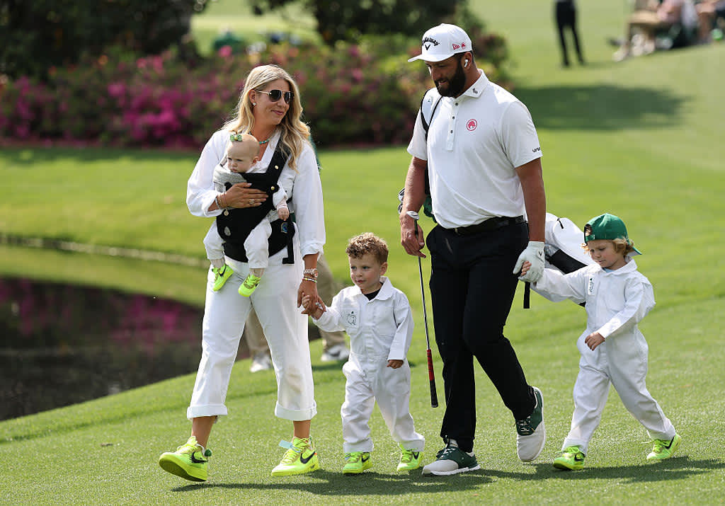 AUGUSTA, GEORGIA - APRIL 09: Jon Rahm of Spain and wife Kelley Cahill walk with their children during the Par Three Contest prior to the 2025 Masters Tournament at Augusta National Golf Club on April 09, 2025 in Augusta, Georgia. (Photo by Richard Heathcote/Getty Images)