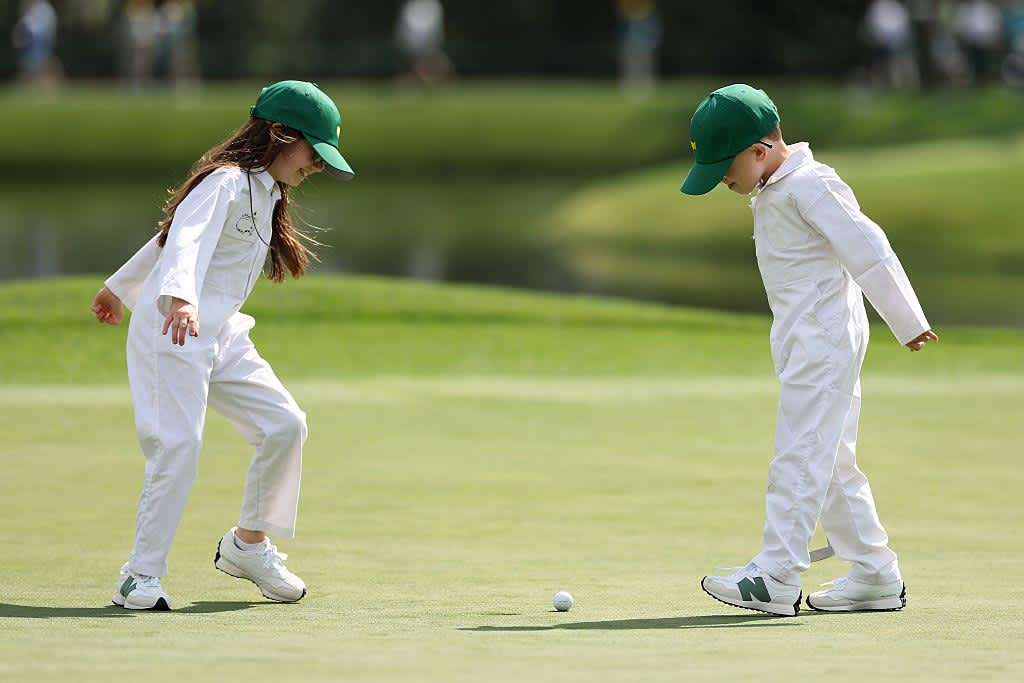 AUGUSTA, GEORGIA - APRIL 09: Children of Brian Harman of the United States, Cooper Marie Harman and Walter Harman play on a green during the Par Three Contest prior to the 2025 Masters Tournament at Augusta National Golf Club on April 09, 2025 in Augusta, Georgia. (Photo by Richard Heathcote/Getty Images)