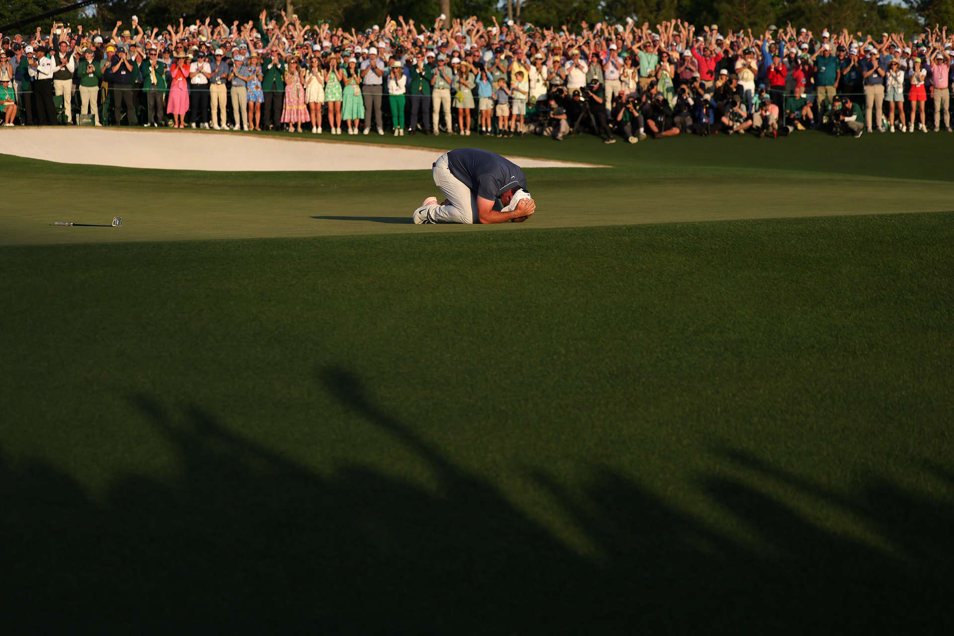 AUGUSTA, GEORGIA - APRIL 13: Rory McIlroy of Northern Ireland celebrates winning the 2025 Masters Tournament after the playoff hole on the 18th green at Augusta National Golf Club on April 13, 2025 in Augusta, Georgia. (Photo by Andrew Redington/Getty Images)